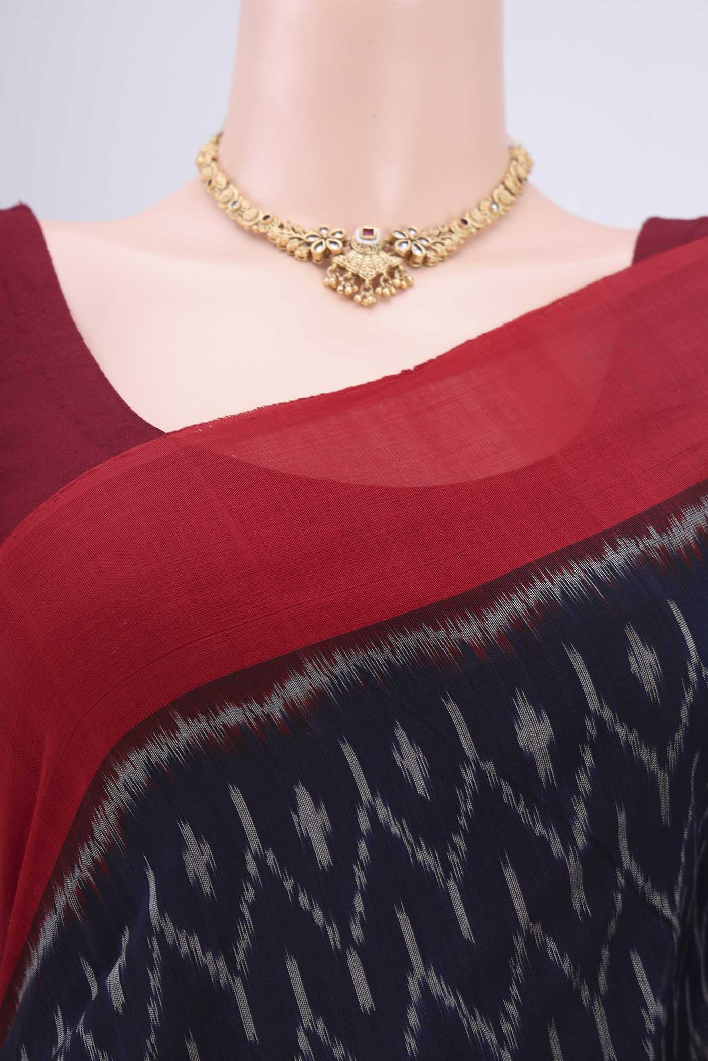 Border image of Navy Blue Pochampally Cotton Saree with Ikat design on the body and Ikat Border. 