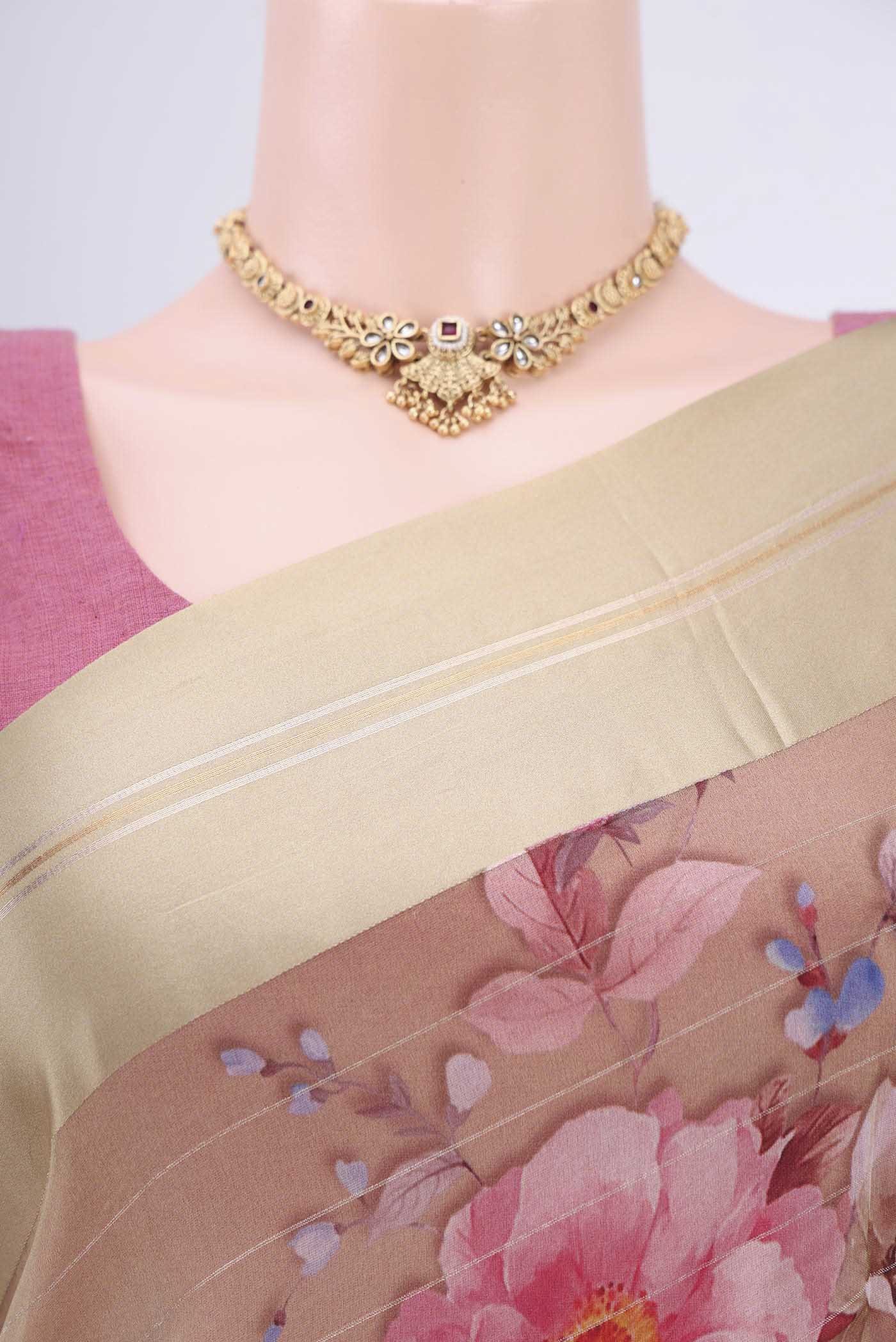 Border image of Beige Organza Silk Saree with Printed design on the body and Satin Border. 