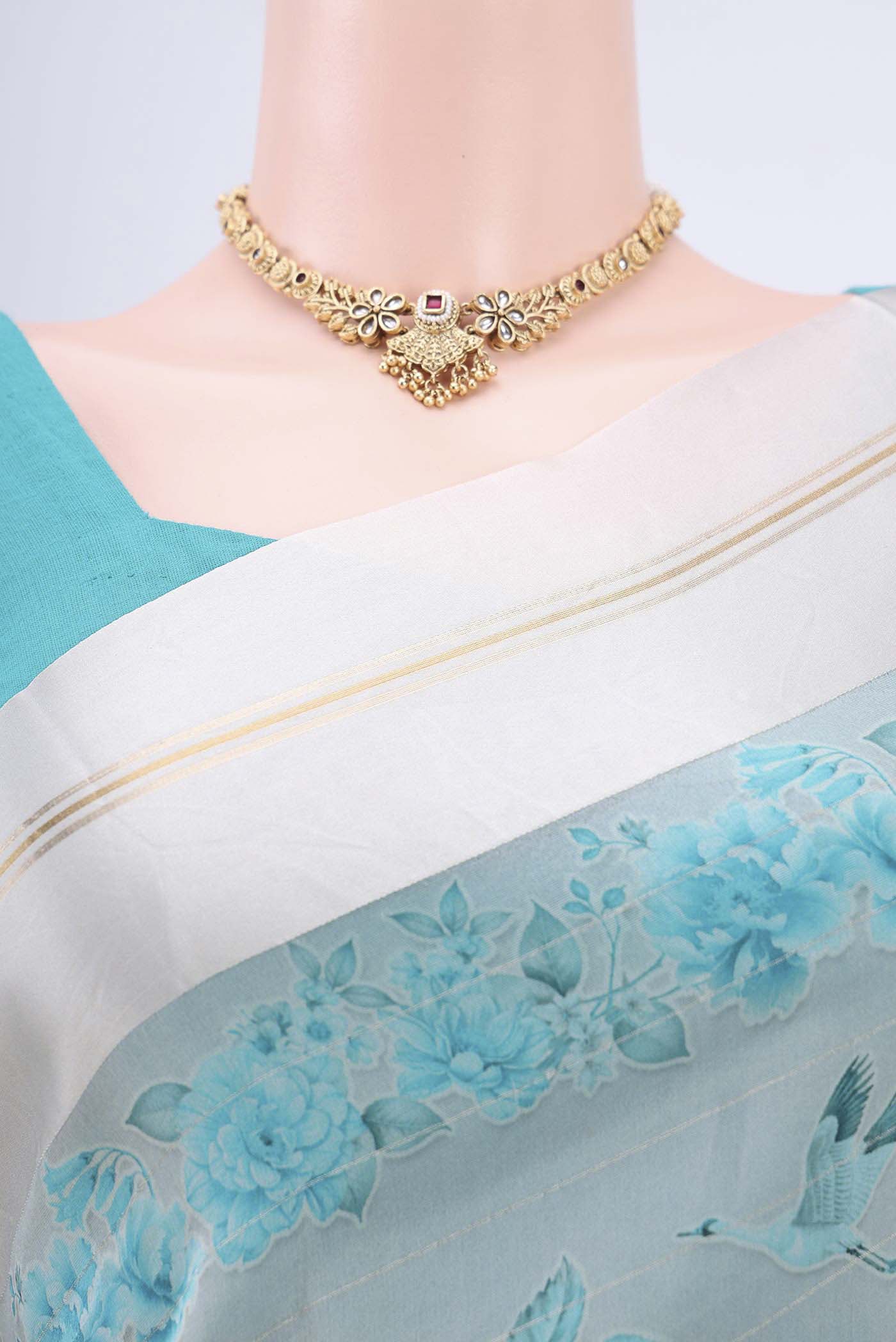 Border image of Beige Organza Silk Saree with Printed design on the body and Satin Border. 