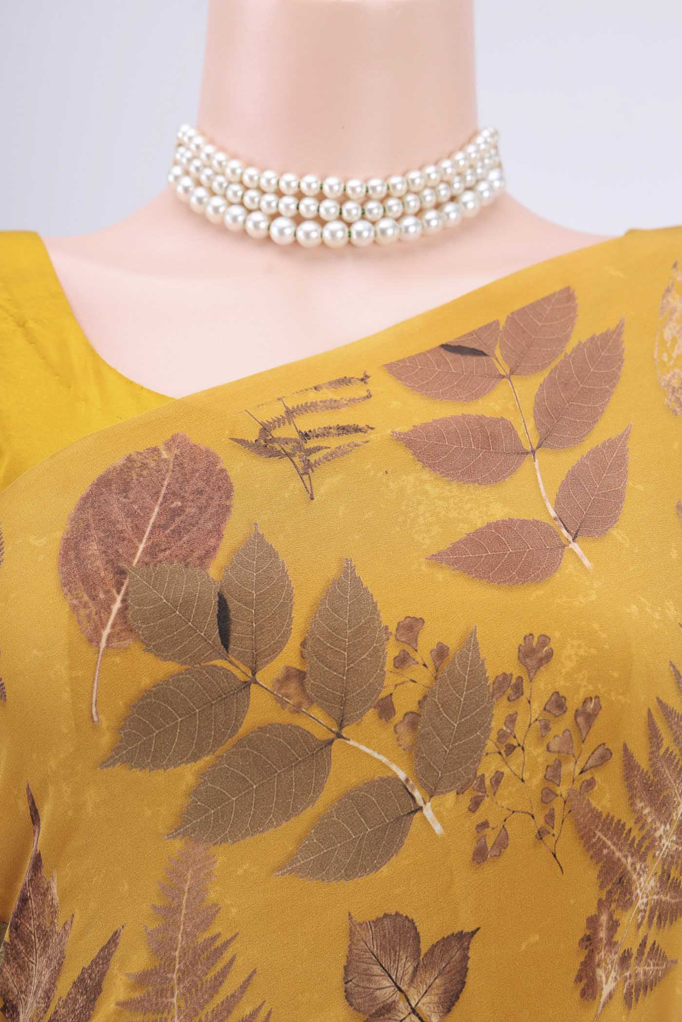 Border image of Mustard Crepe Saree with Floral Print on the body and Plain Border. 