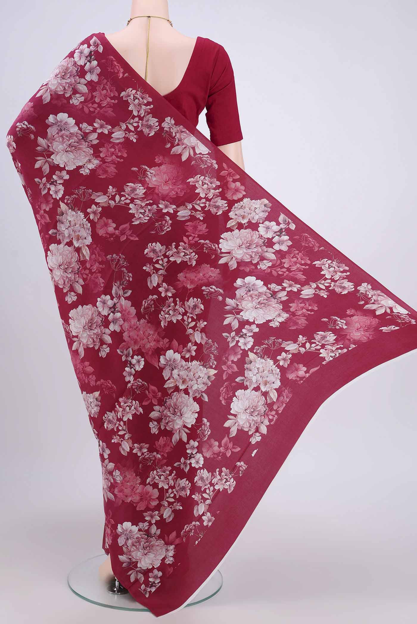 Flat view of Magenta Crepe Saree with Floral Print on the body and Plain Border. 