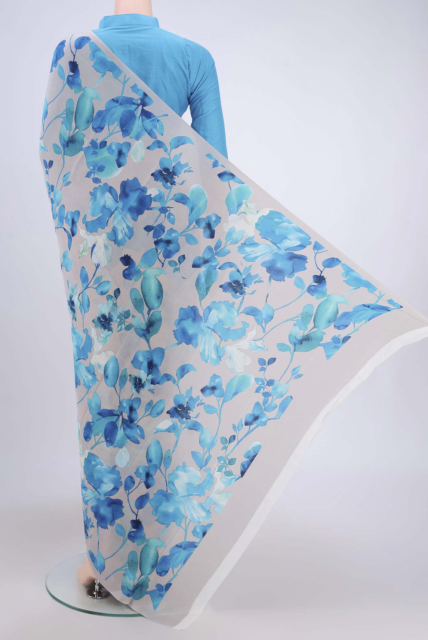 Flat view of Off White Crepe Saree with Floral Print on the body and Plain Border. 