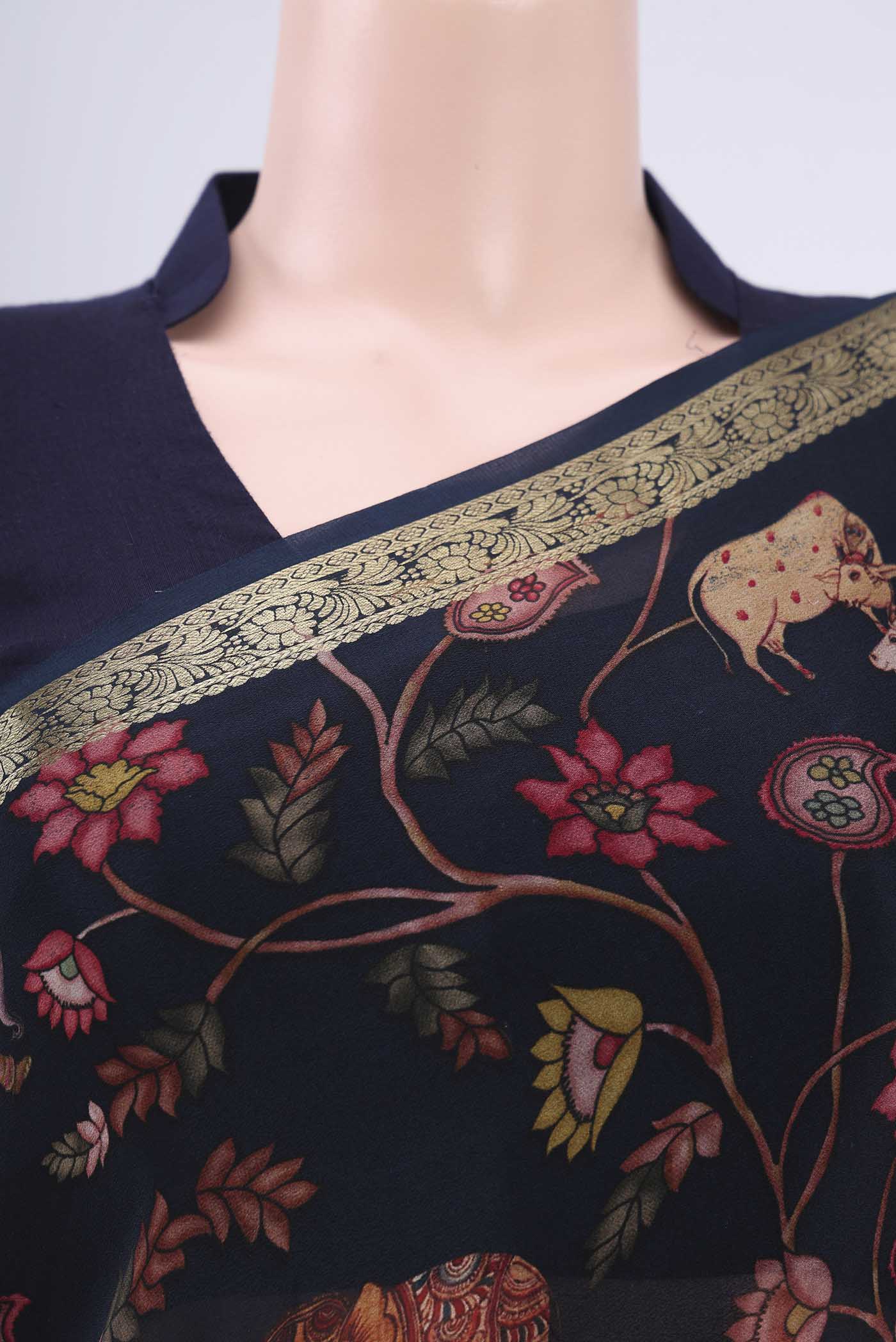 Border image of Black Crepe Saree with Floral Print on the body and Plain Border. 