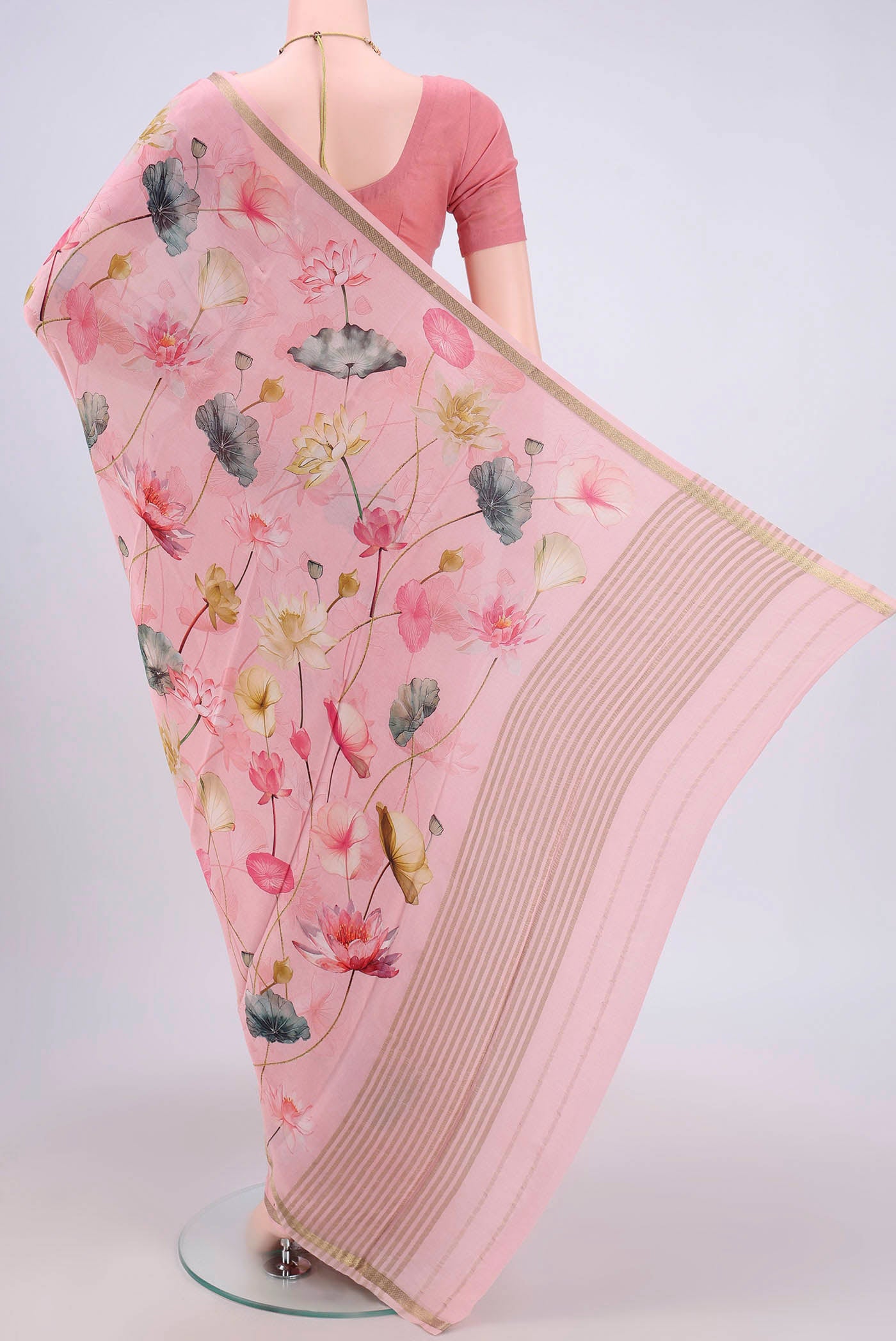 Flat view of Rose pink Crepe Saree with Floral Print on the body and Plain Border. 