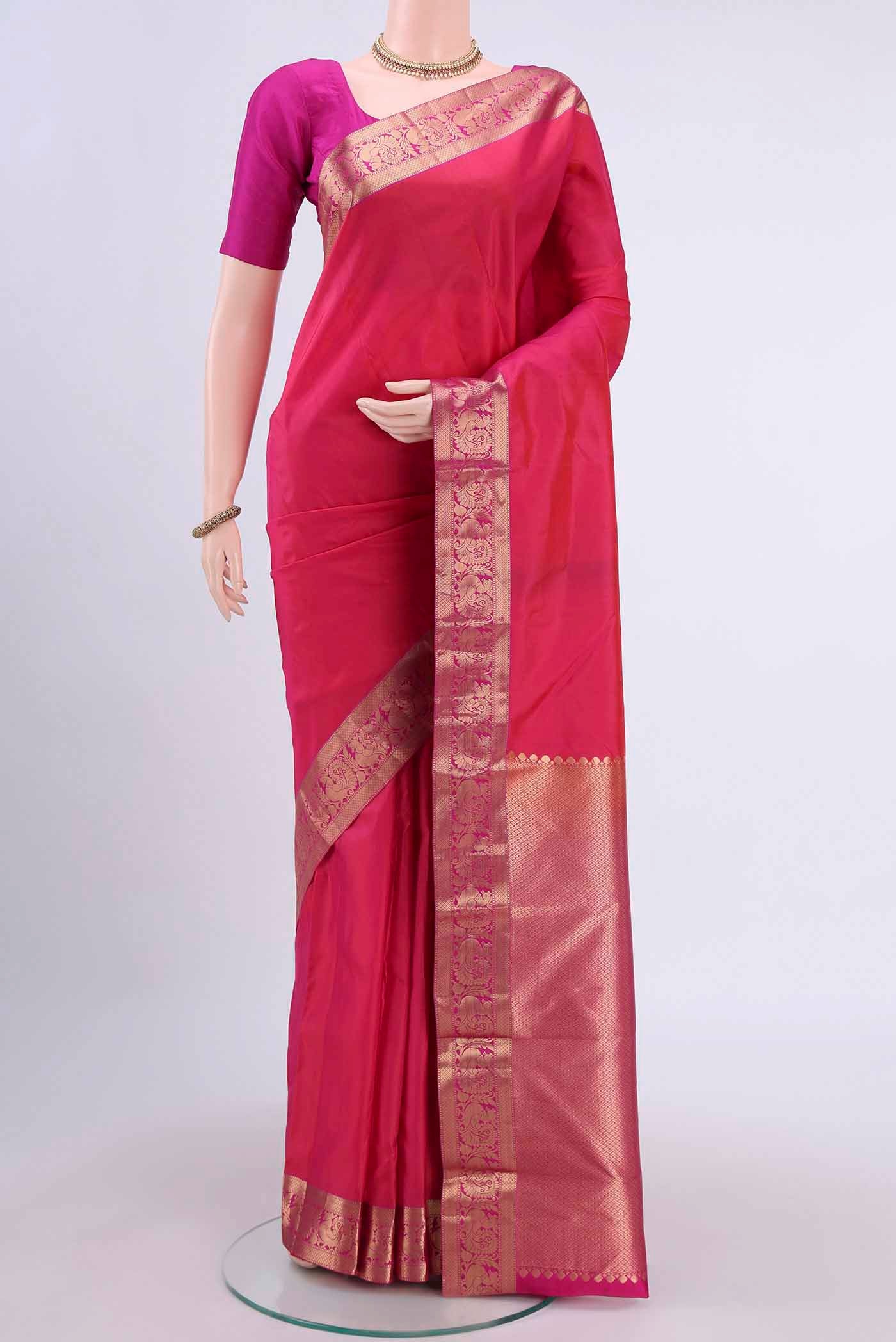 Dark Pink Dual Tone Nangavalli Silk [ Salem ] Saree with Plain Body and Zari Border displayed on a mannequin