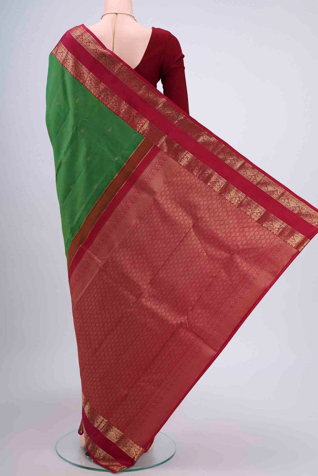 Flat view of Green Dual Tone Nangavalli Silk [ Salem ] Saree with Zari Butta on the body and Zari Border