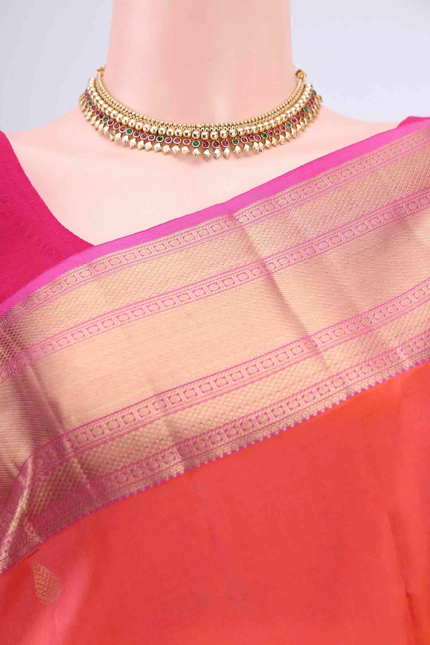 Border image of Brick Orange Dual Tone Nangavalli Silk [ Salem ] Saree with Zari Butta on the body and Zari Border