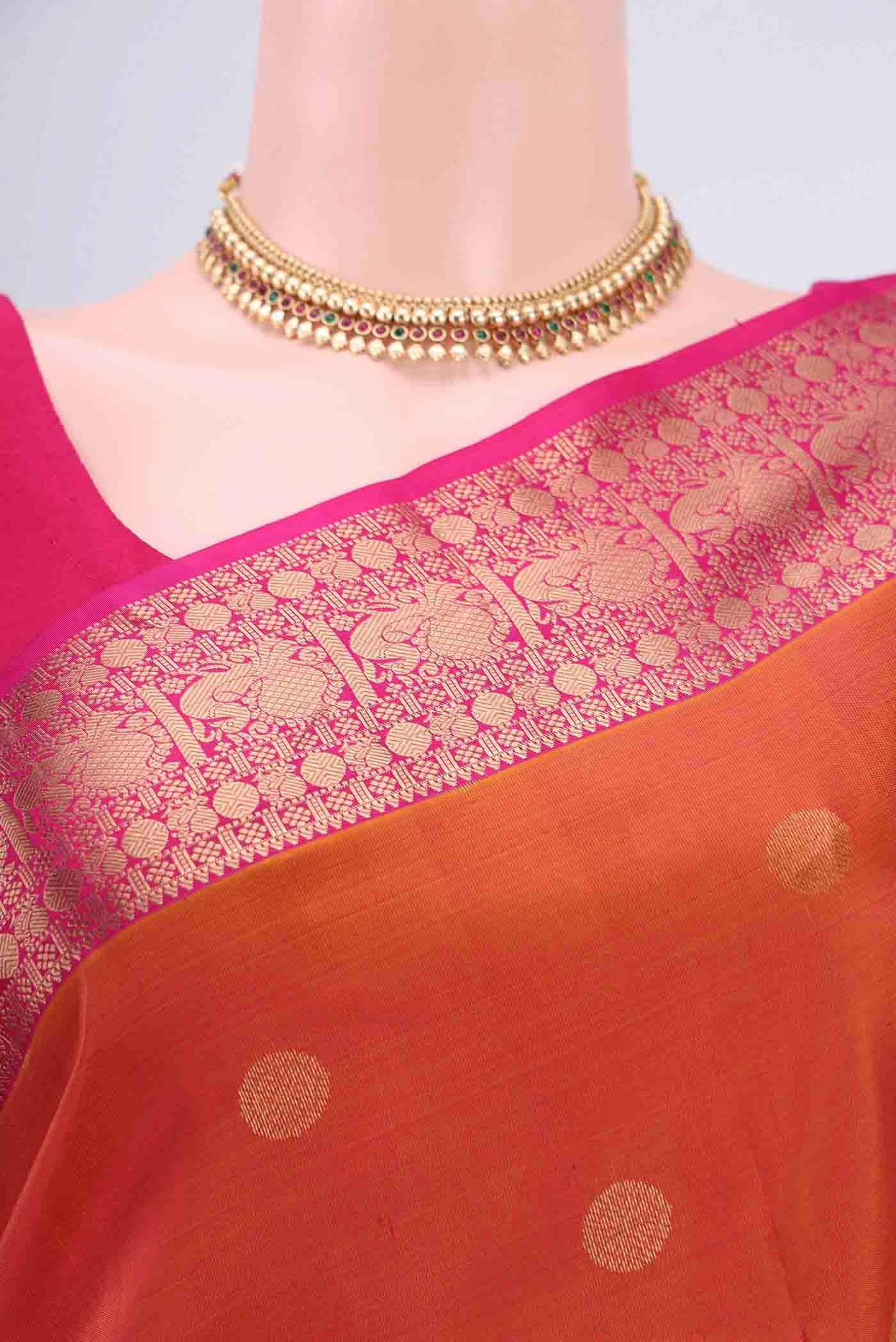 Border image of Brick Orange Dual Tone Nangavalli Silk [ Salem ] Saree with Zari Butta on the body and Zari Border