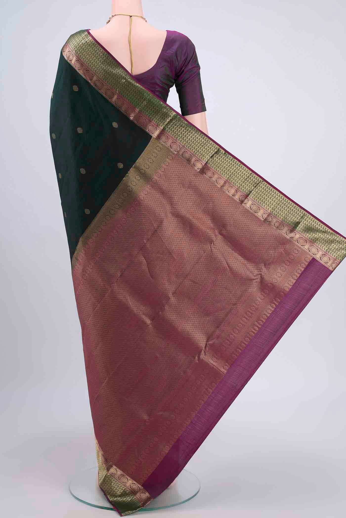 Flat view of Bottle Green Dual Tone Nangavalli Silk [ Salem ] Saree with Zari Butta on the body and Zari Border