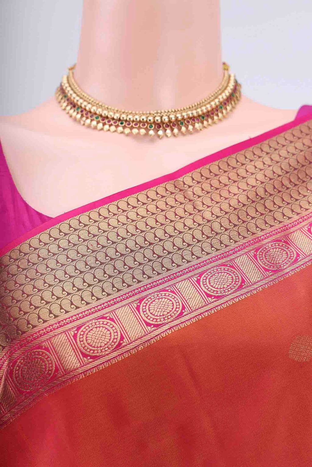 Border image of Brick Orange Dual Tone Nangavalli Silk [ Salem ] Saree with Zari Butta on the body and Zari Border