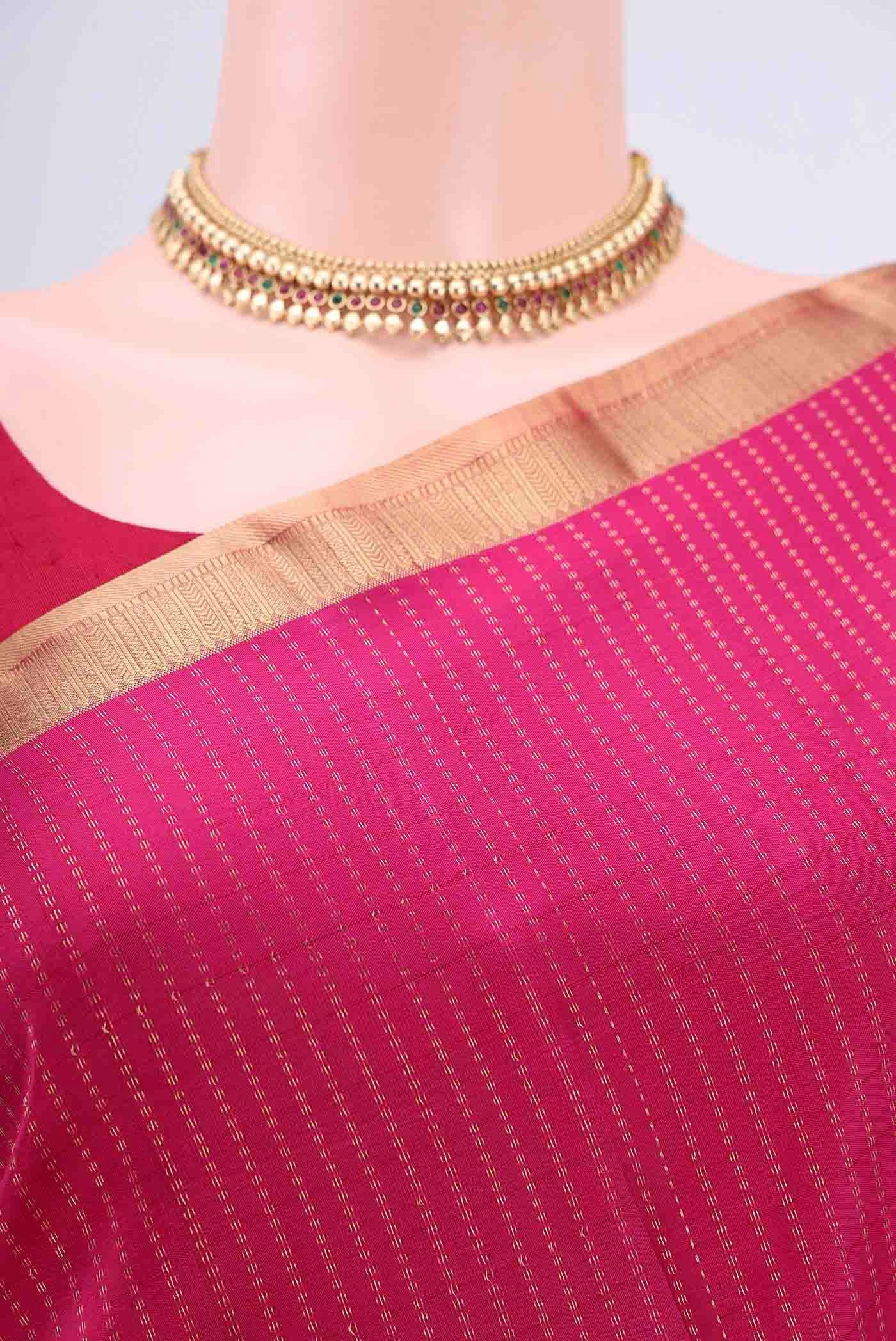 Border image of Rani Pink Dual Tone Nangavalli Silk [ Salem ] Saree with Stripes on the body and Zari Border