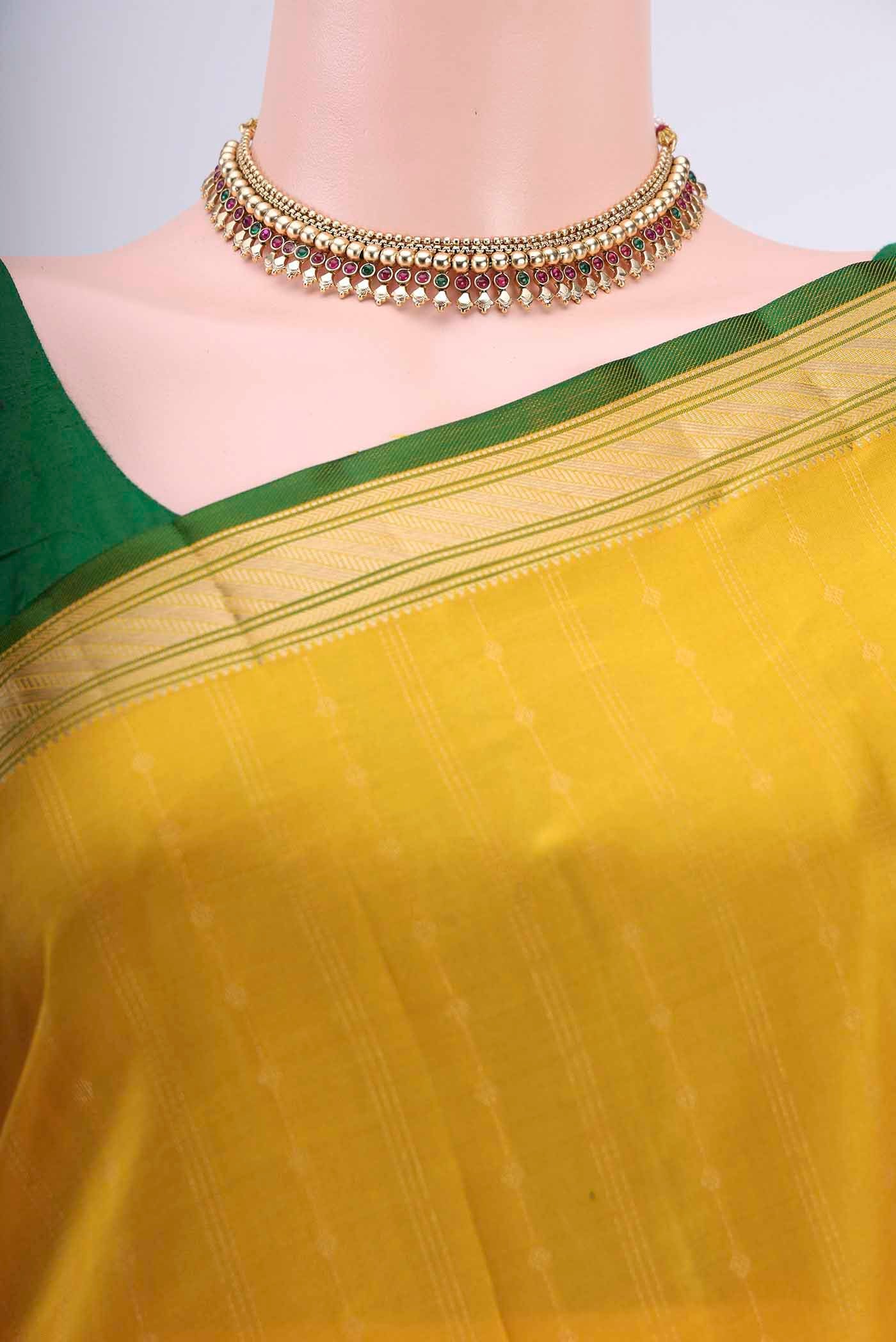 Border image of Lemon Yellow Dual Tone Nangavalli Silk [ Salem ] Saree with Stripes on the body and Zari Border