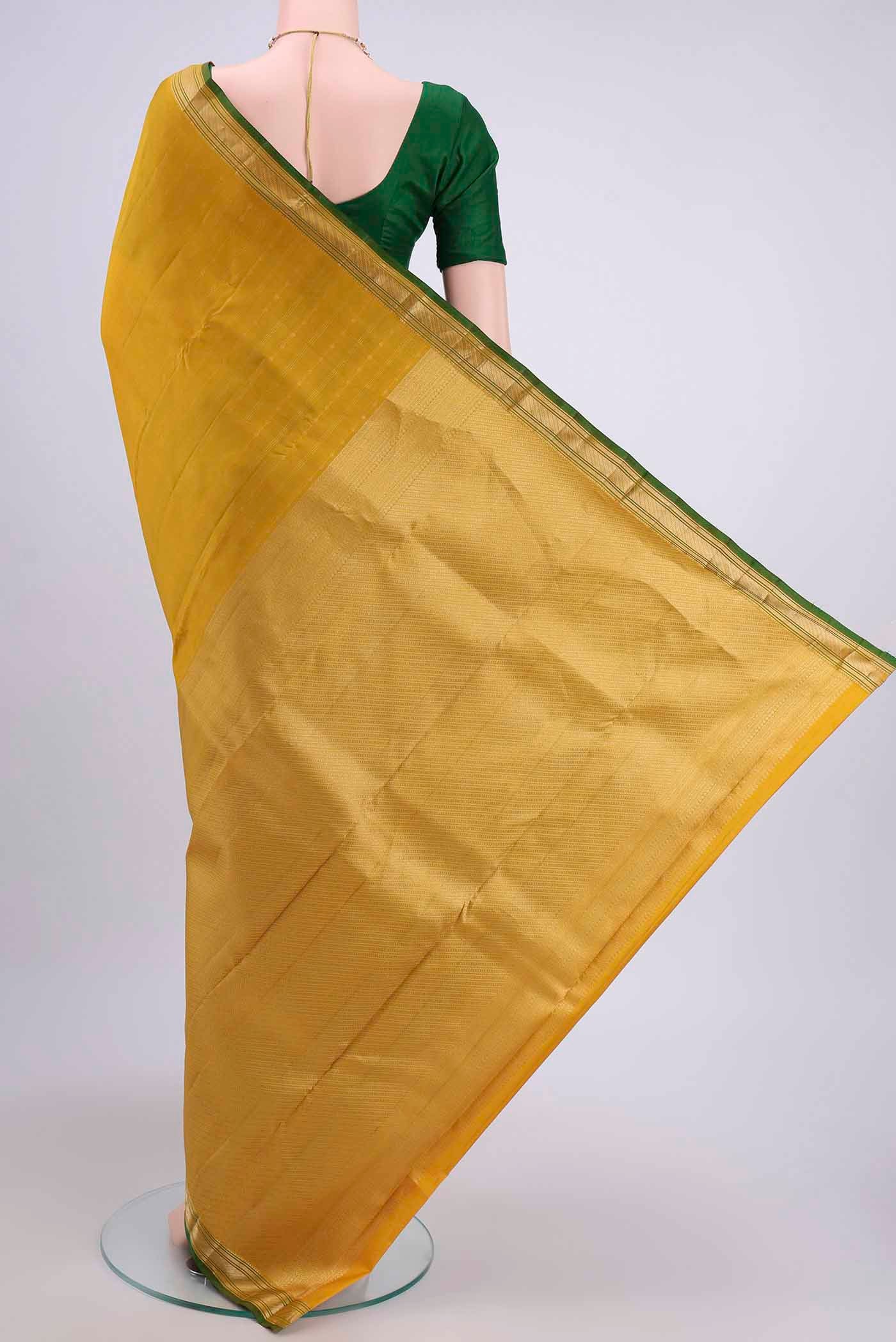 Flat view of Lemon Yellow Dual Tone Nangavalli Silk [ Salem ] Saree with Stripes on the body and Zari Border
