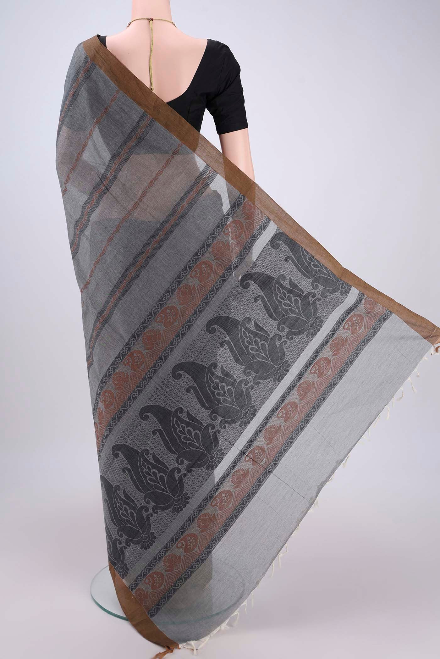 Flat view of Grey Kanchi Cotton Saree with Stripes on the body and Thread Border. 
