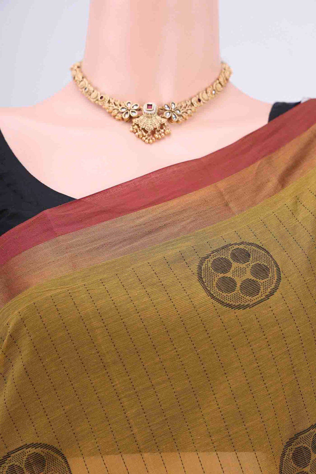Border image of Mustard Kanchi Cotton Saree with Stripes on the body and Zari Border. 