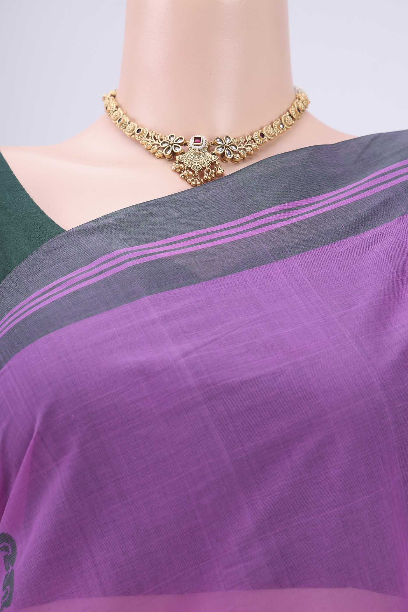 Border image of Lavender Kanchi Cotton Saree with Thread Butta on the body and Thread Border. 