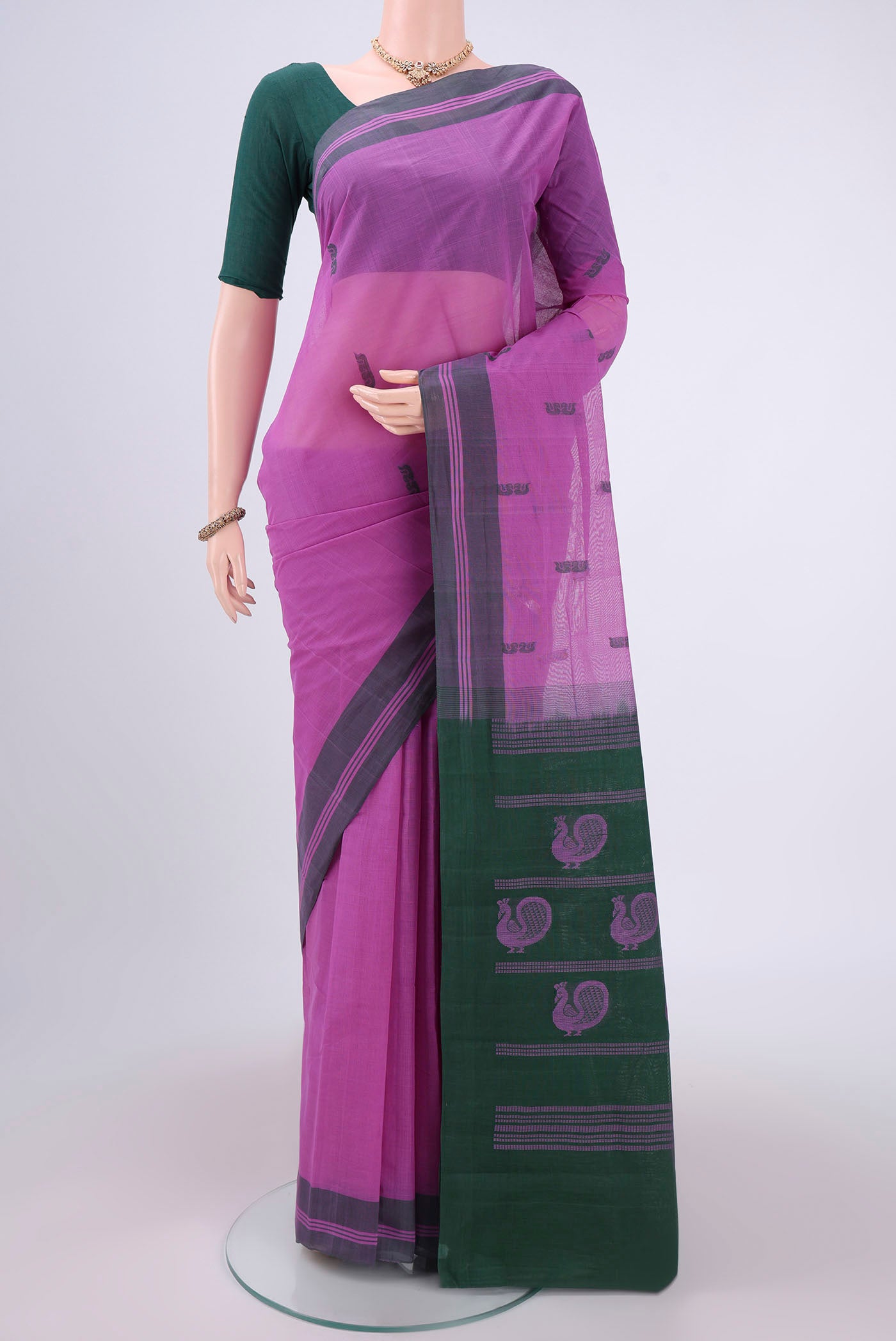 Lavender Kanchi Cotton Saree with Thread Butta on the body and Thread Border.  displayed on a mannequin
