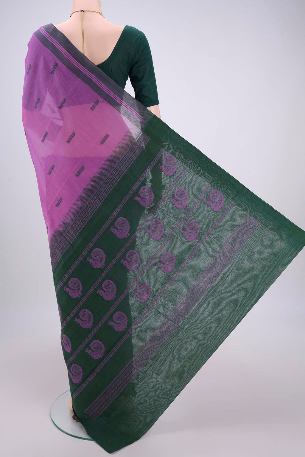 Flat view of Lavender Kanchi Cotton Saree with Thread Butta on the body and Thread Border. 