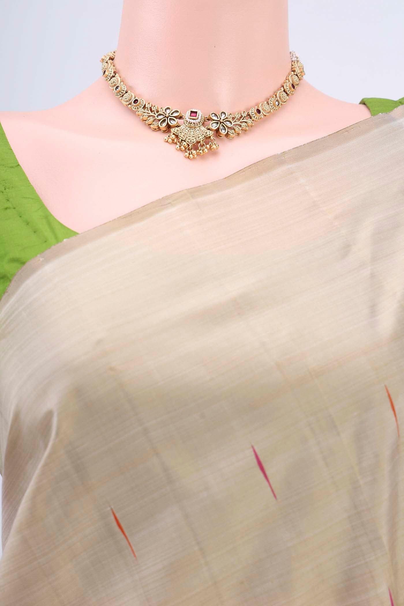 Border image of Dark Beige Kanchipuram Saree with Thread Butta on the body and Temple Border