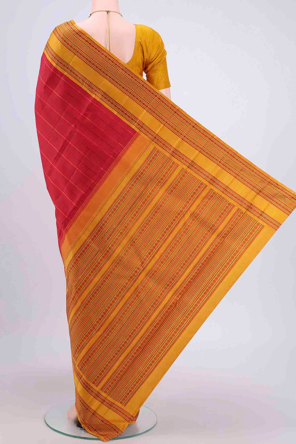 Flat view of Red Dual Tone Kanchipuram Saree with Stripes on the body and Thread Border