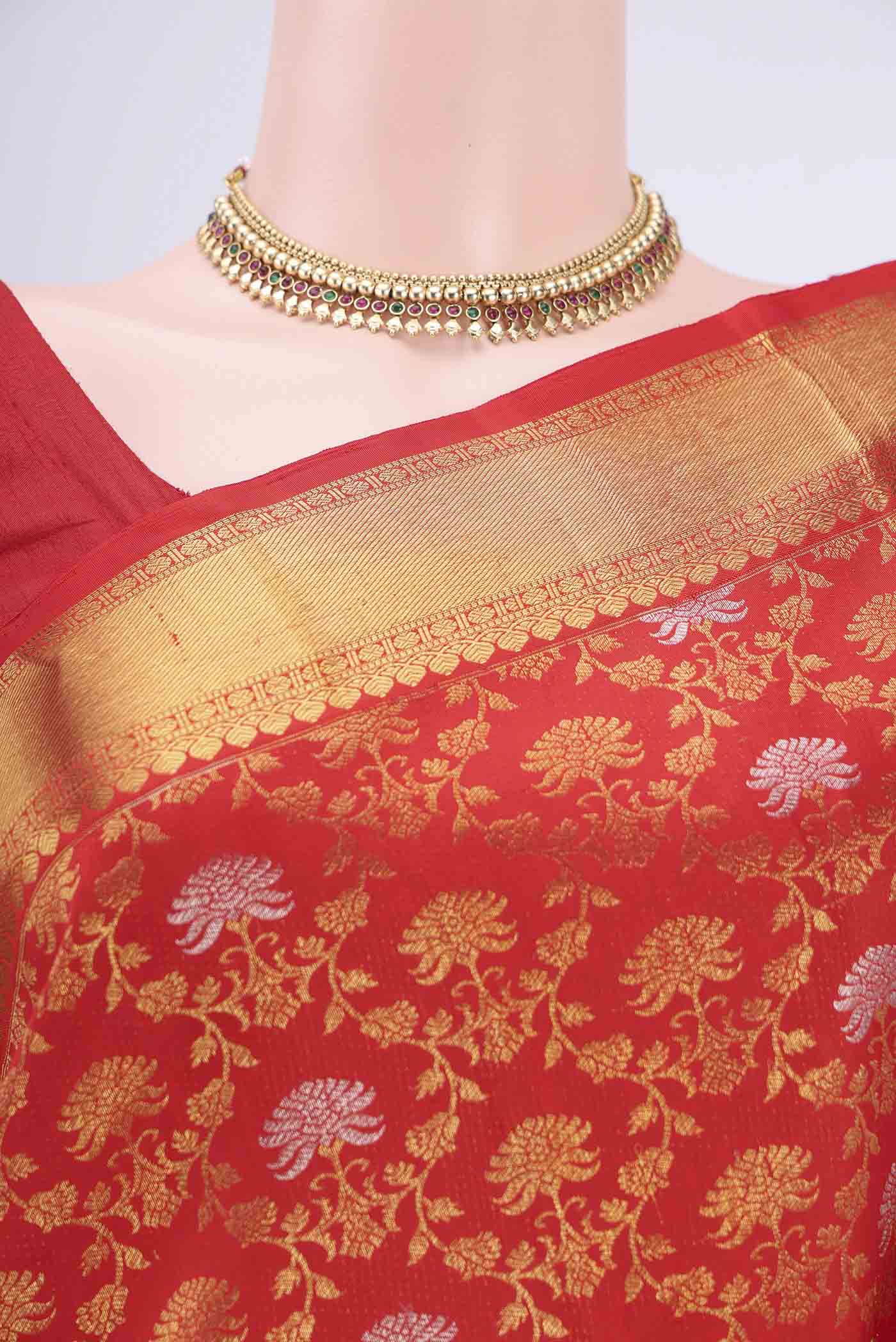Border image of Red Kanchipuram Saree with Zari Brocade on the body and Zari Border. 