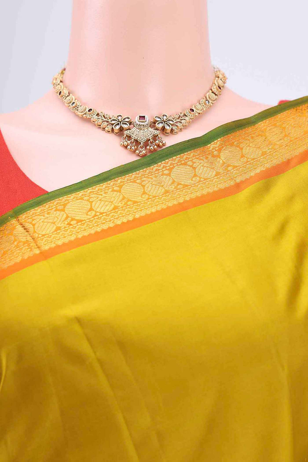 Border image of Acid Green Kanchipuram Saree with Plain Body and Zari Border