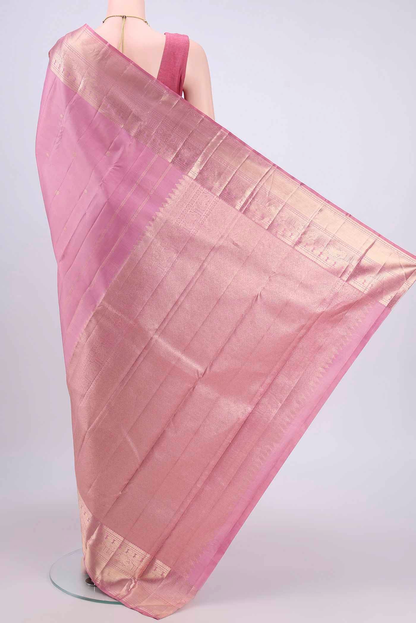 Flat view of Rose pink Dual Tone Kanchipuram Saree with Zari Brocade on the body and Zari Border