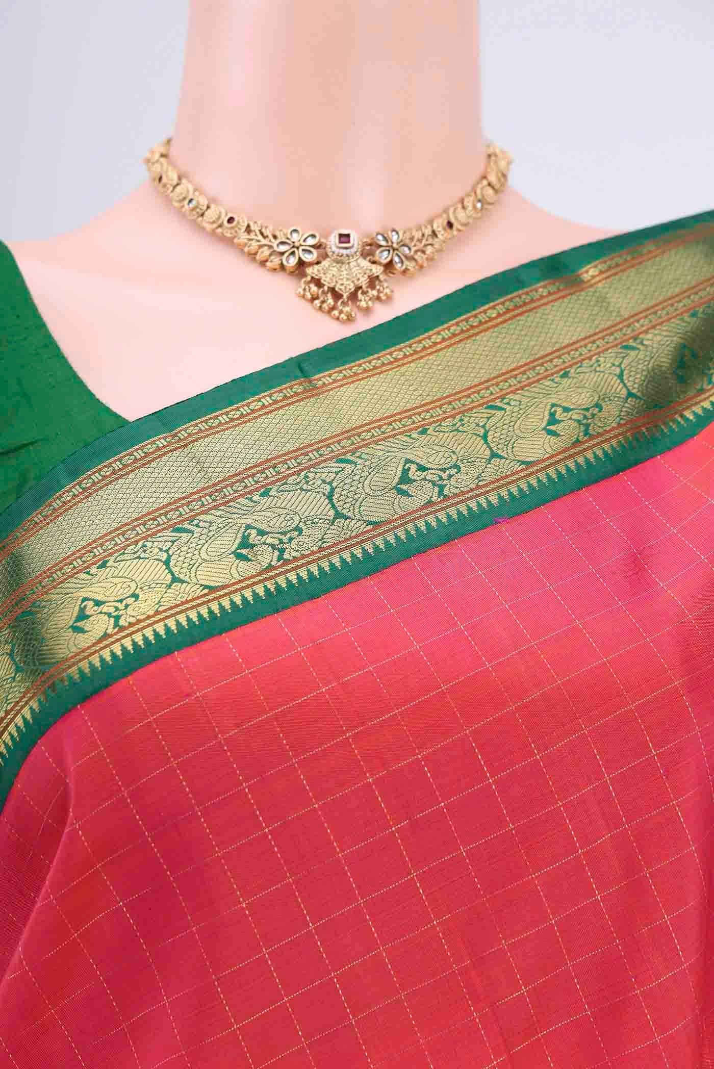 Border image of Dark Pink Kanchipuram Saree with Checked design on the body and Zari Border