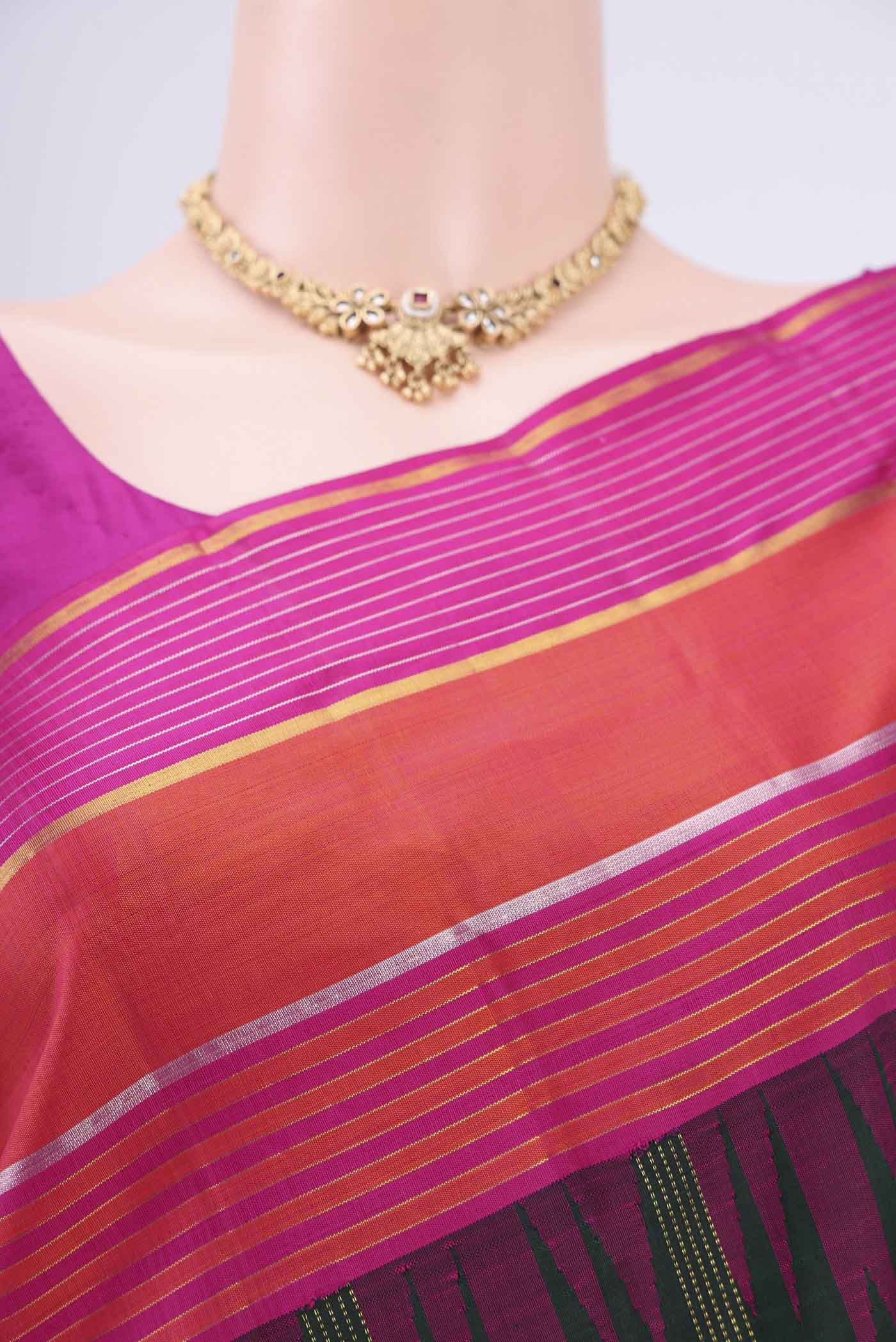 Border image of Bottle Green Dual Tone Kanjivaram Saree with Checked design on the body and Zari Border. 