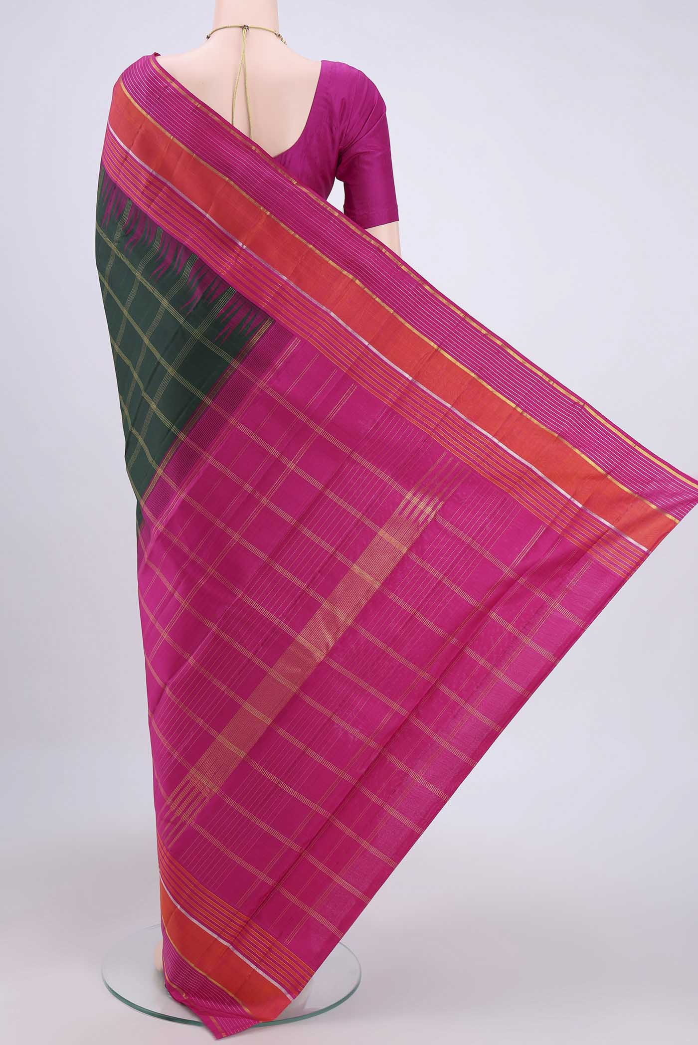 Flat view of Bottle Green Dual Tone Kanjivaram Saree with Checked design on the body and Zari Border. 