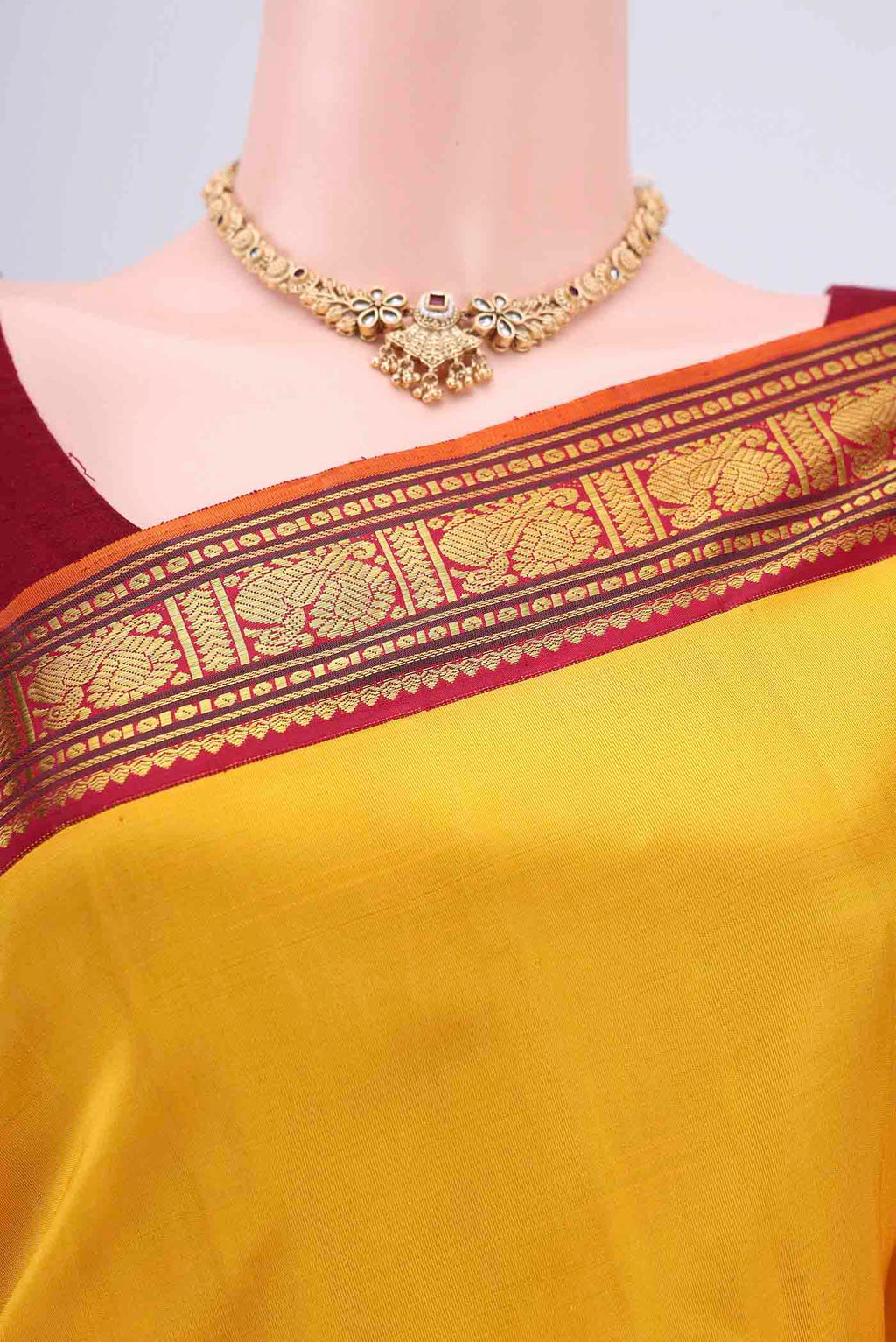 Border image of Yellow Kanjivaram Silk Saree with Plain Body and Zari Border. 