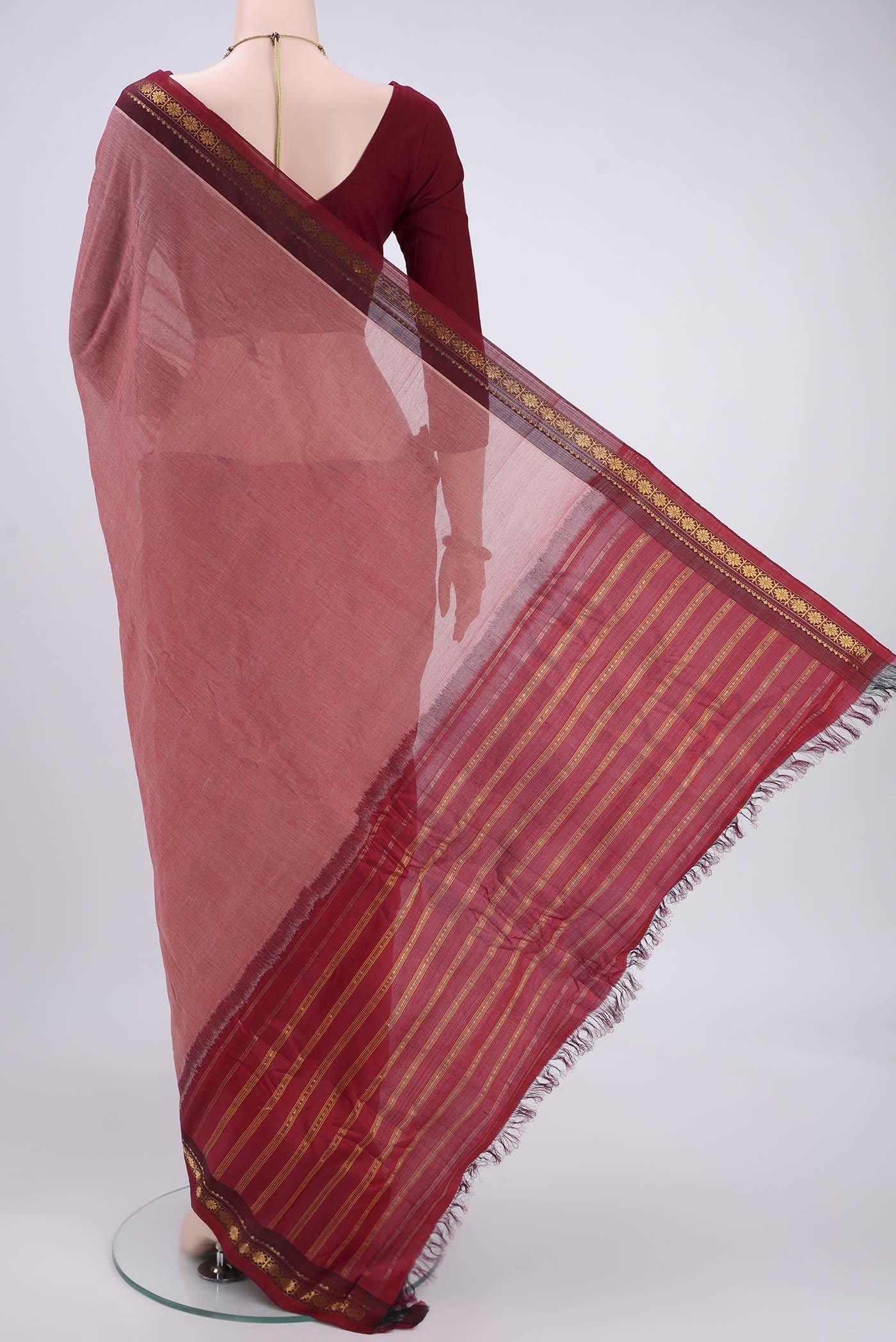 Flat view of Peach Gadwal Silk Cotton Saree with Plain Body and Zari Border. 