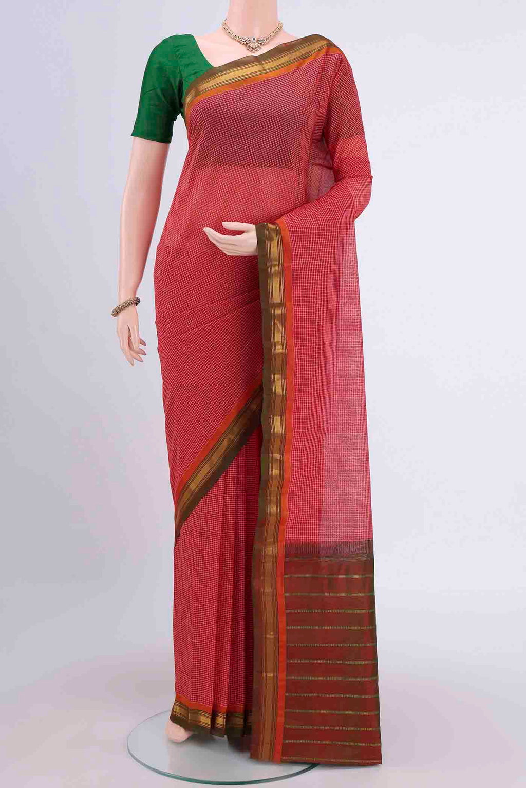 Red Gadwal cotton Saree with Stripes on the body and Zari Border displayed on a mannequin