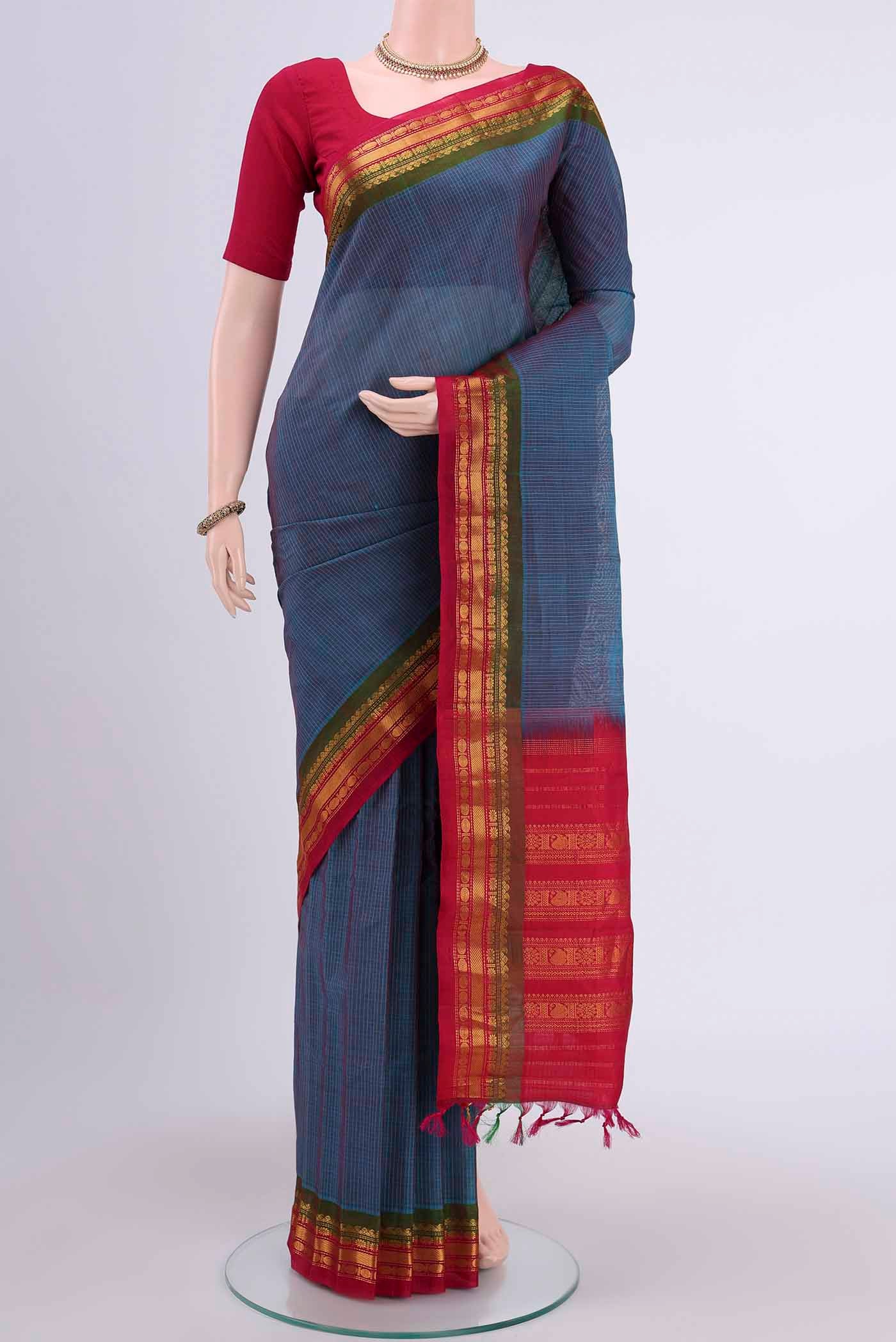 Dark Blue Gadwal Silk Saree with Stripes on the body and Zari Border displayed on a mannequin