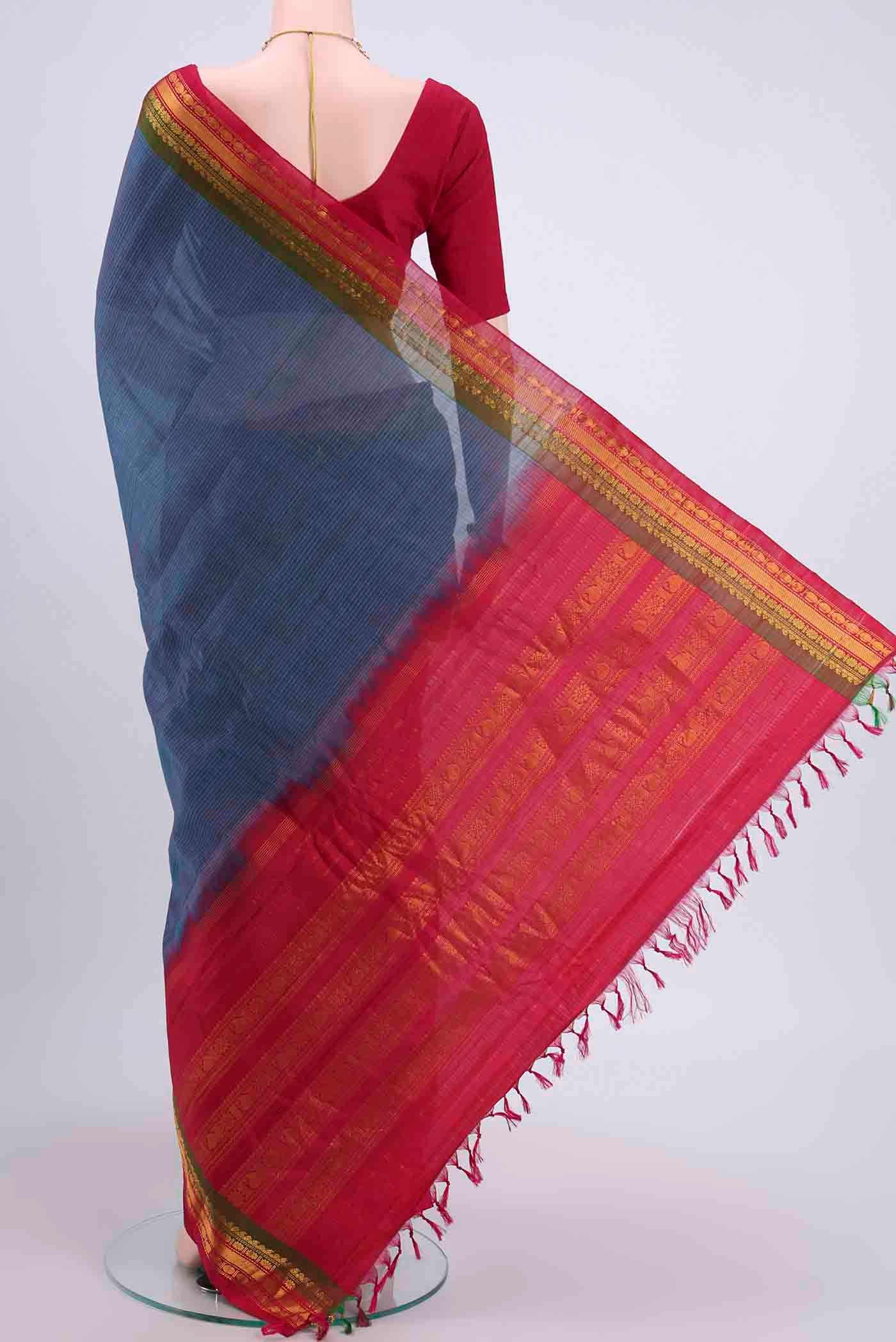 Flat view of Dark Blue Gadwal Silk Saree with Stripes on the body and Zari Border