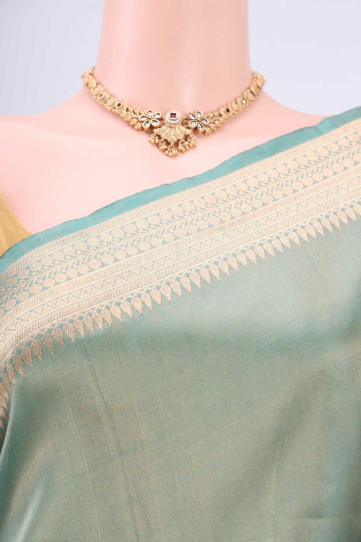 Border image of Sea Green Banarasi Tissue Silk Saree with Zari Butta on the body and Zari Border. 