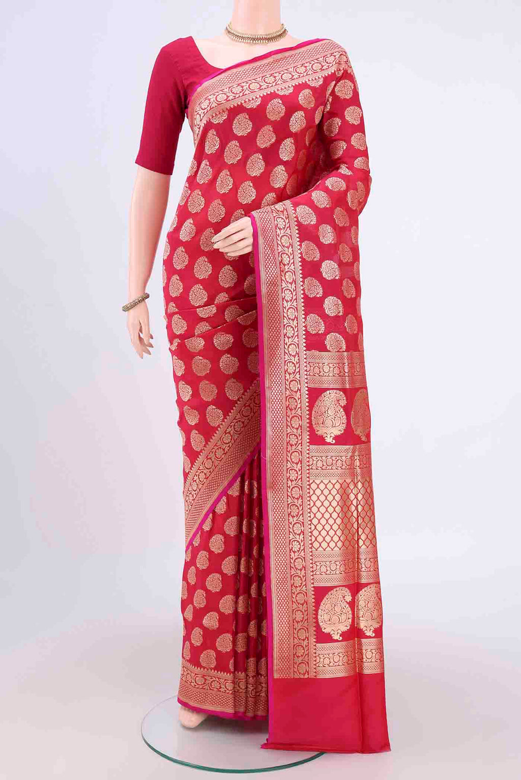 Dark Pink Dual Tone Banarasi Silk Saree with Zari Butta on the body and Zari Border.  displayed on a mannequin