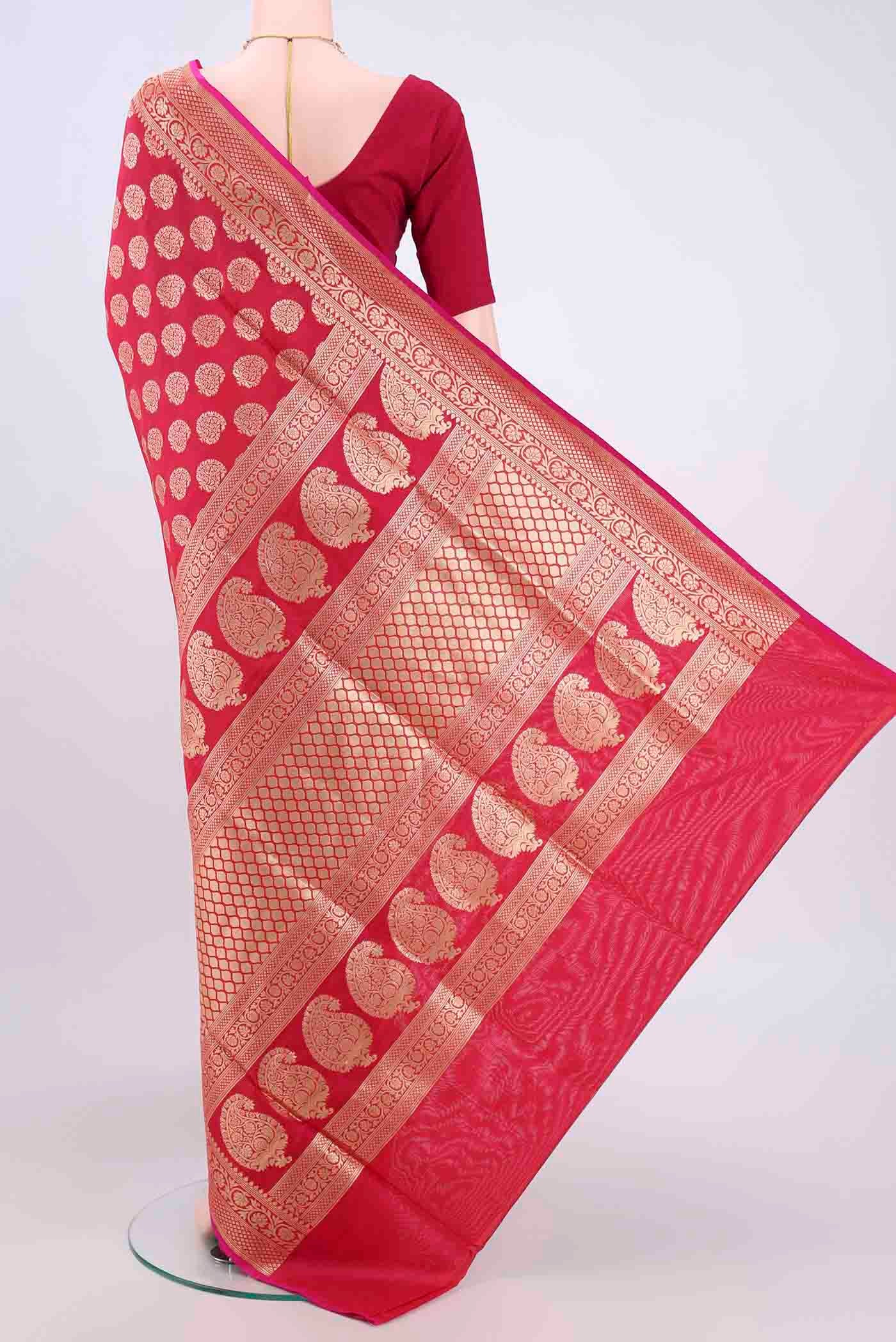 Flat view of Dark Pink Dual Tone Banarasi Silk Saree with Zari Butta on the body and Zari Border. 