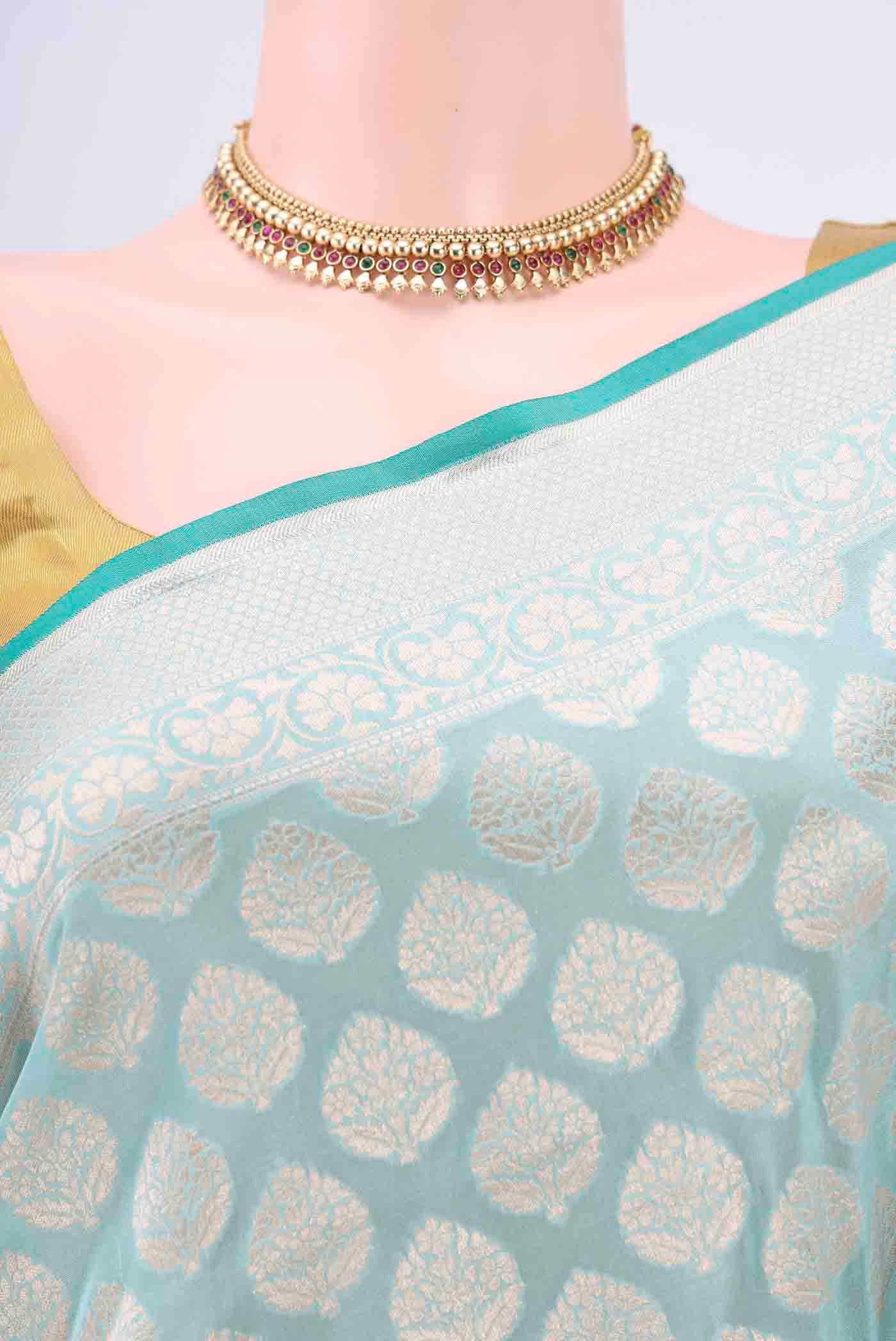Border image of Sky Blue Dual Tone Banarasi Silk Saree with Zari Butta on the body and Zari Border. 
