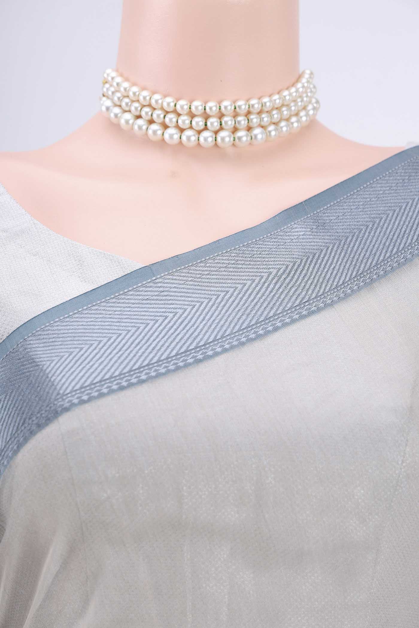 Border image of Davys Grey Maheshwari Silk Cotton Saree with Stripes on the body and Zari Border. 