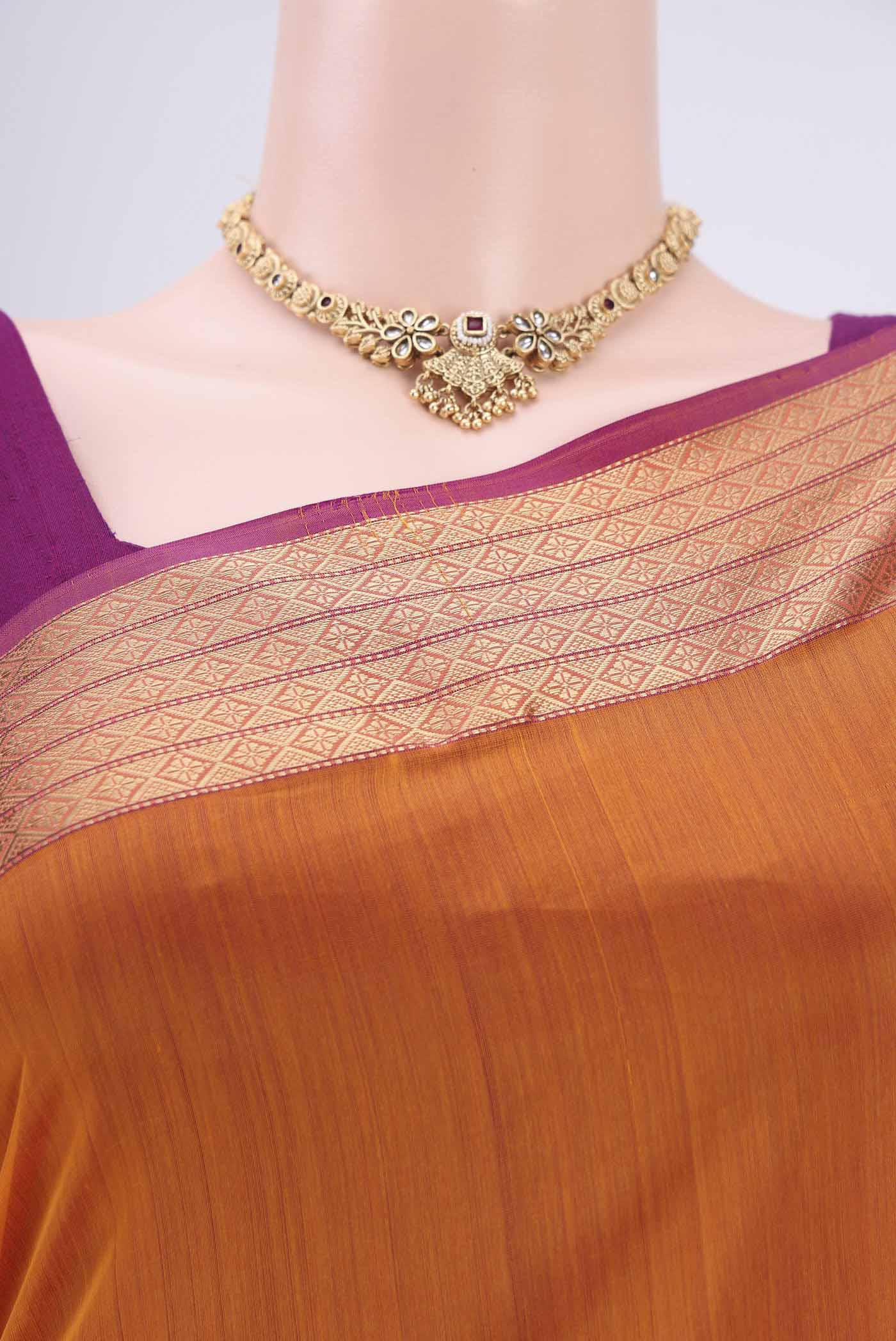 Border image of Yellow Dual Tone Maheshwari Silk Cotton Saree with Plain Body and Zari Border. 