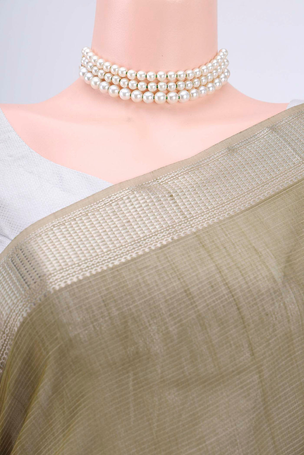 Border image of Mehandi Green Maheshwari Silk Cotton Saree with Stripes on the body and Zari Border. 