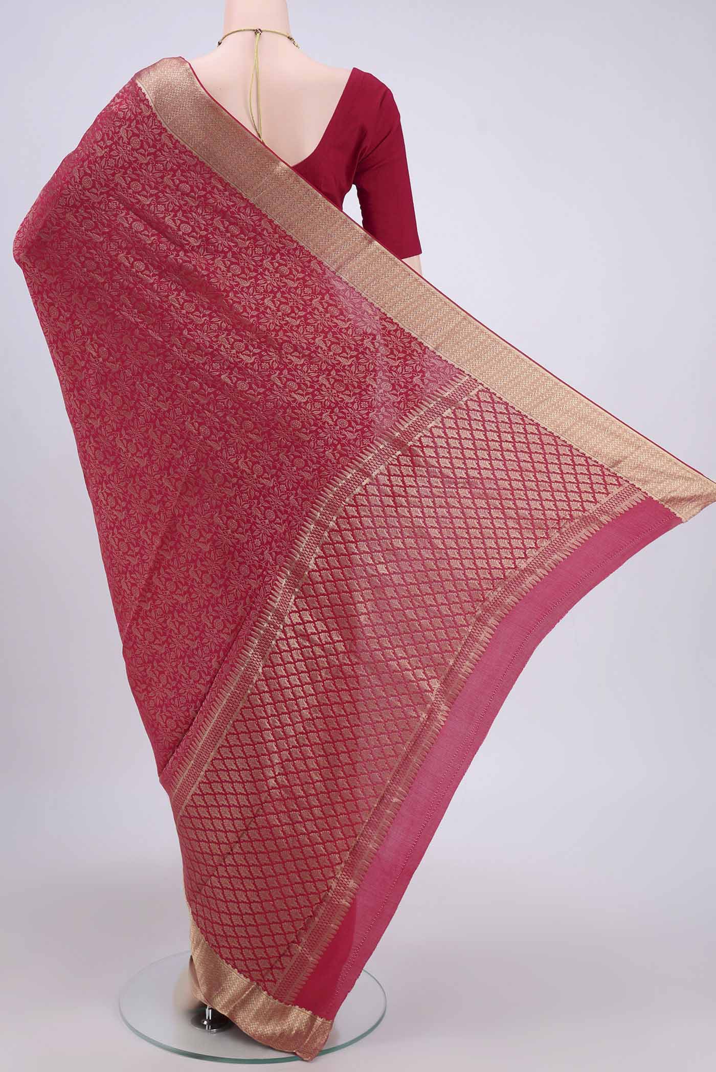 Flat view of Dark Pink Mysore Crepe Saree with Zari Brocade on the body and Zari Border. 
