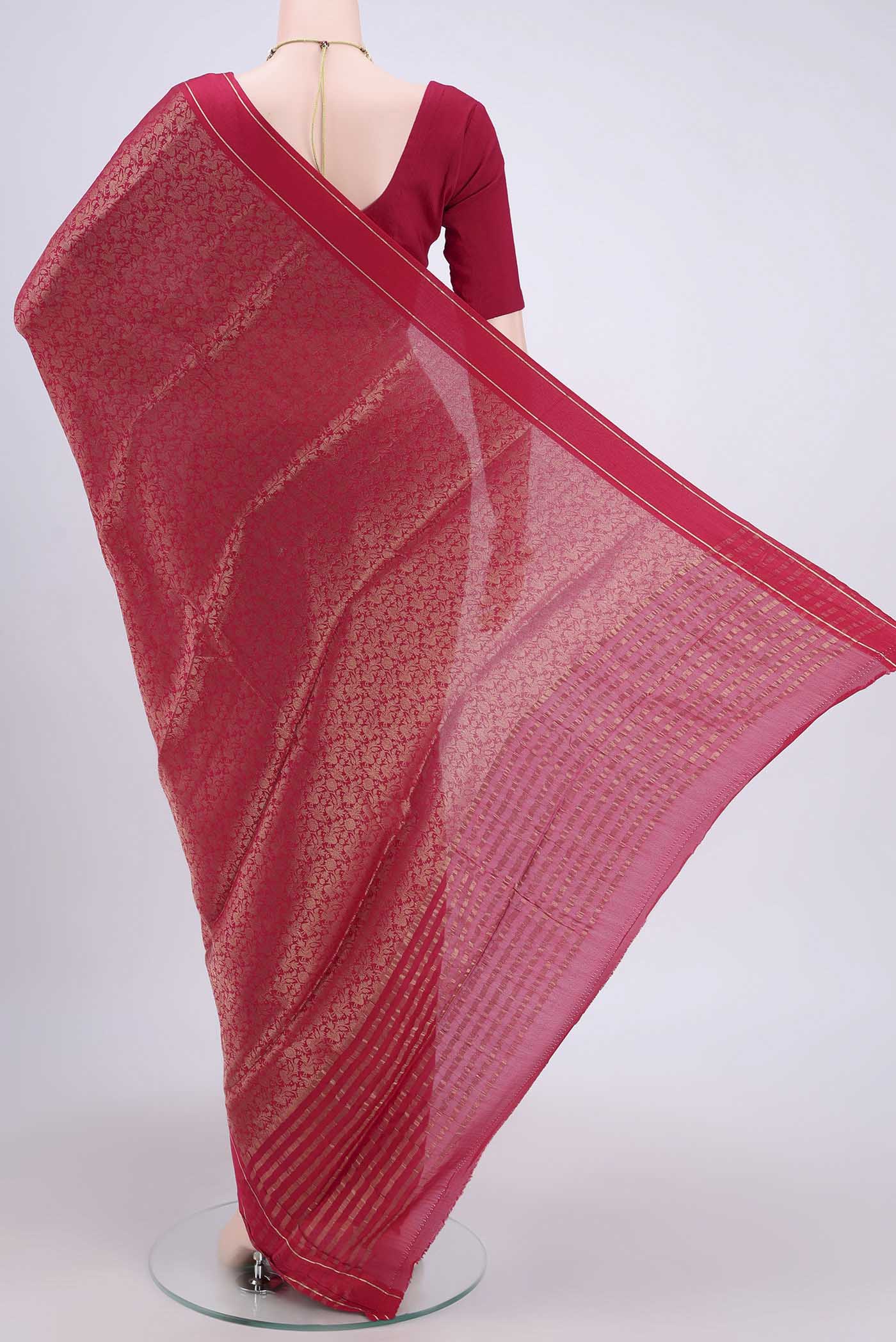 Flat view of Dark Pink Mysore Crepe Saree with Zari Brocade on the body and Zari Border. 