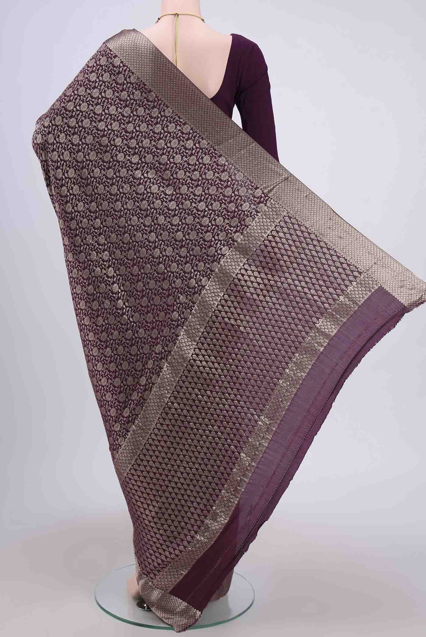 Flat view of Burgundy Mysore Crepe Saree with Zari Brocade on the body and Zari Border. 