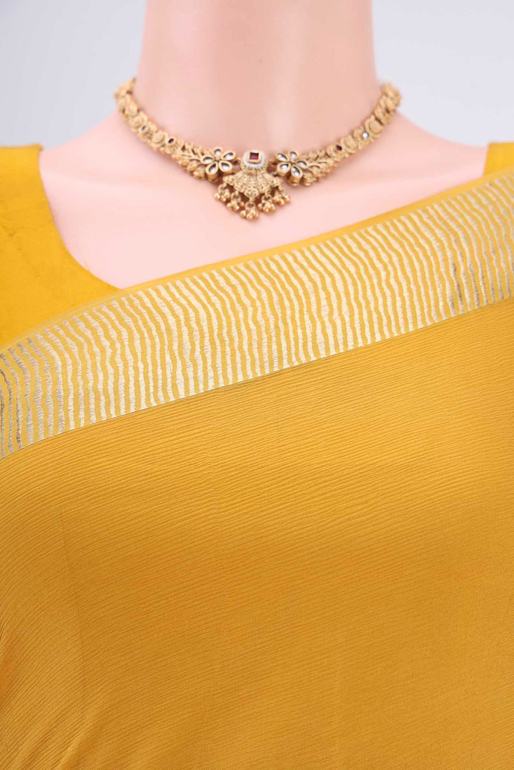 Border image of Yellow Mysore Chiffon Saree with Plain Body and Zari Border. 