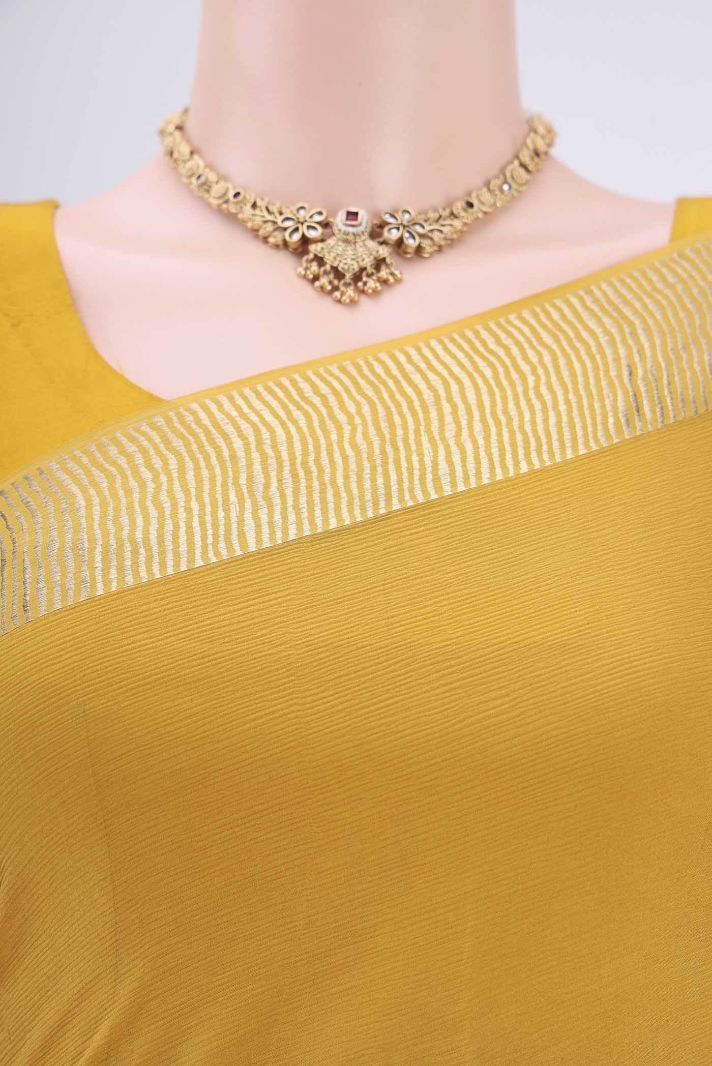 Border image of Yellow Mysore Chiffon Saree with Plain Body and Zari Border. 