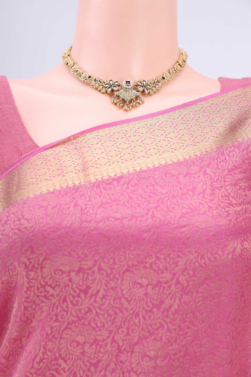 Border image of Rani Pink Mysore Crepe Saree with Zari Brocade on the body and Zari Border. 