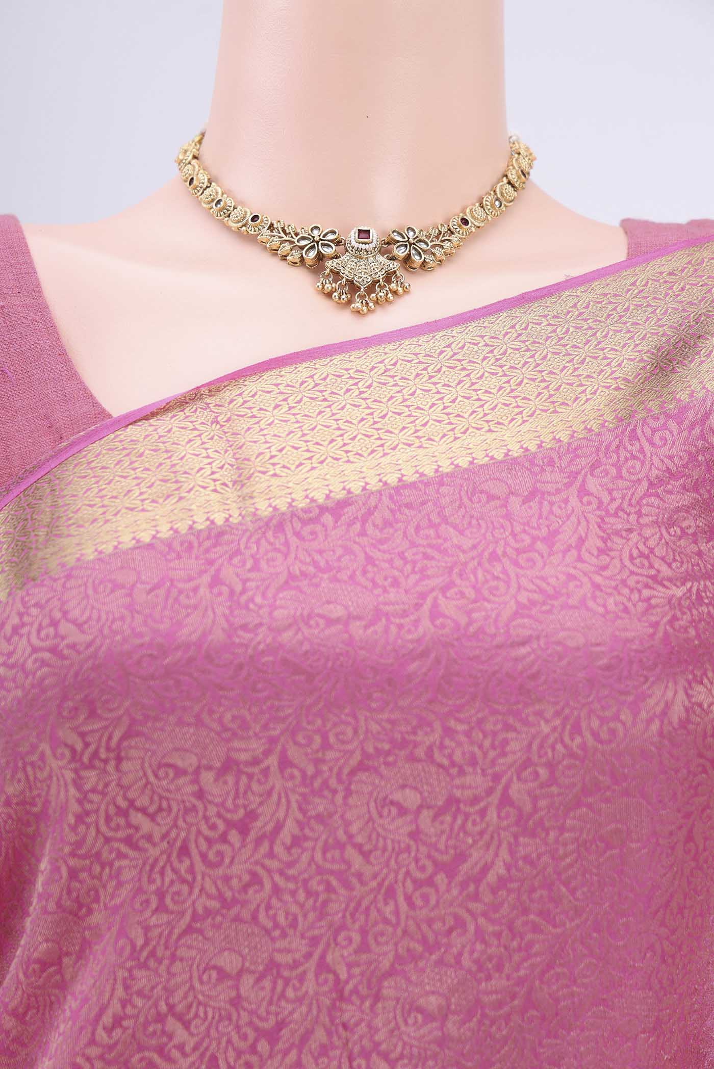 Border image of Rani Pink Mysore Crepe Saree with Zari Brocade on the body and Zari Border. 