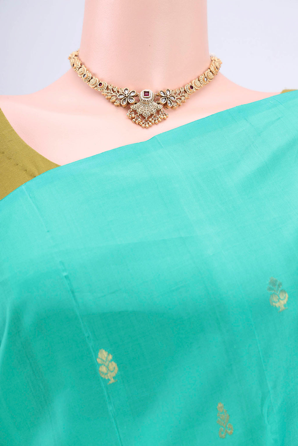 Border image of Turquoise Dual Tone Kanjivaram Silk Saree with Zari Butta on the body and Zari Border. 